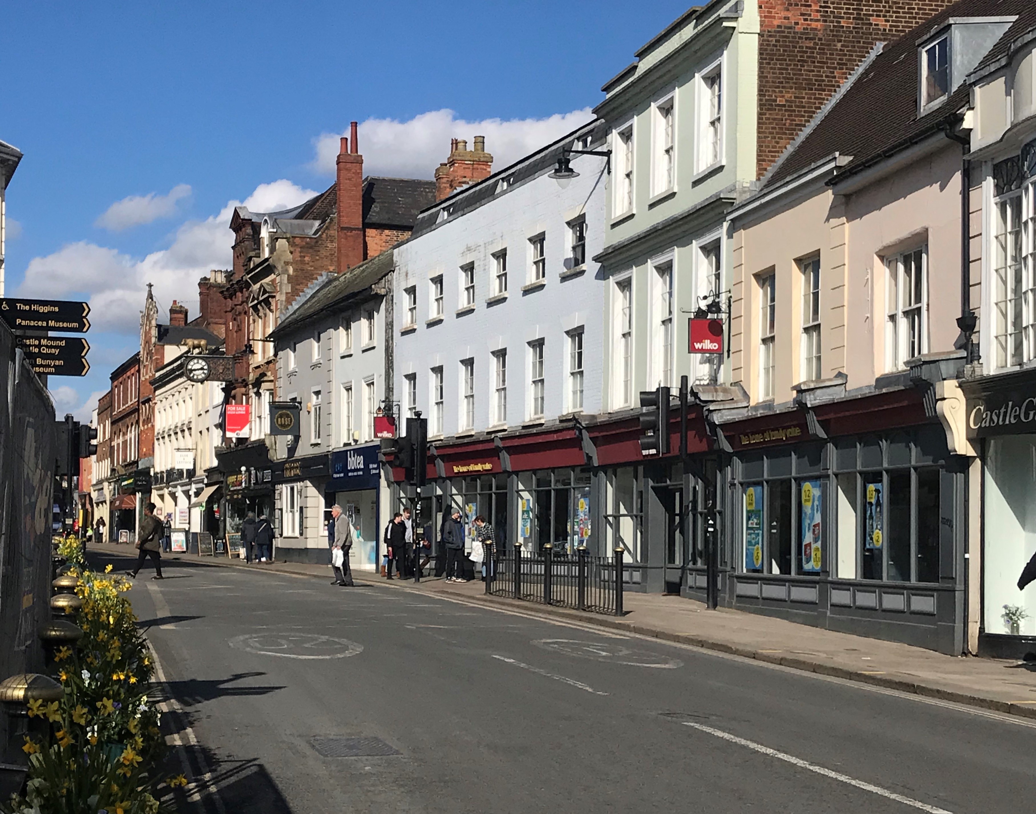 Historic buildings and shop fronts lining the High Street, Bedford.
