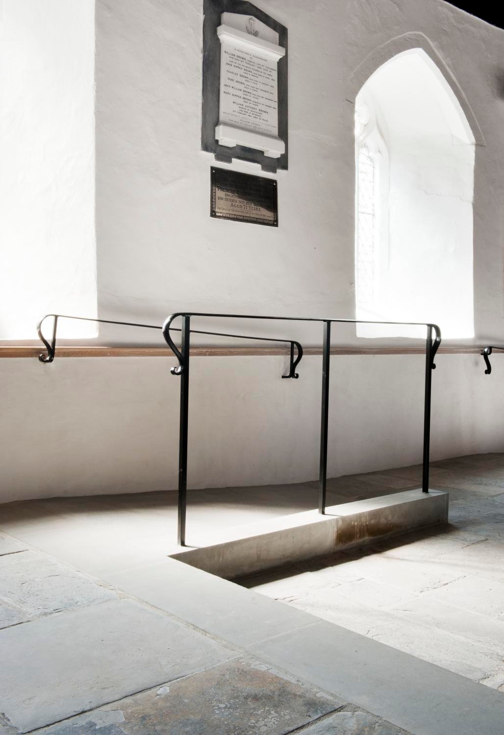 Access ramp and stair rail inside a church
