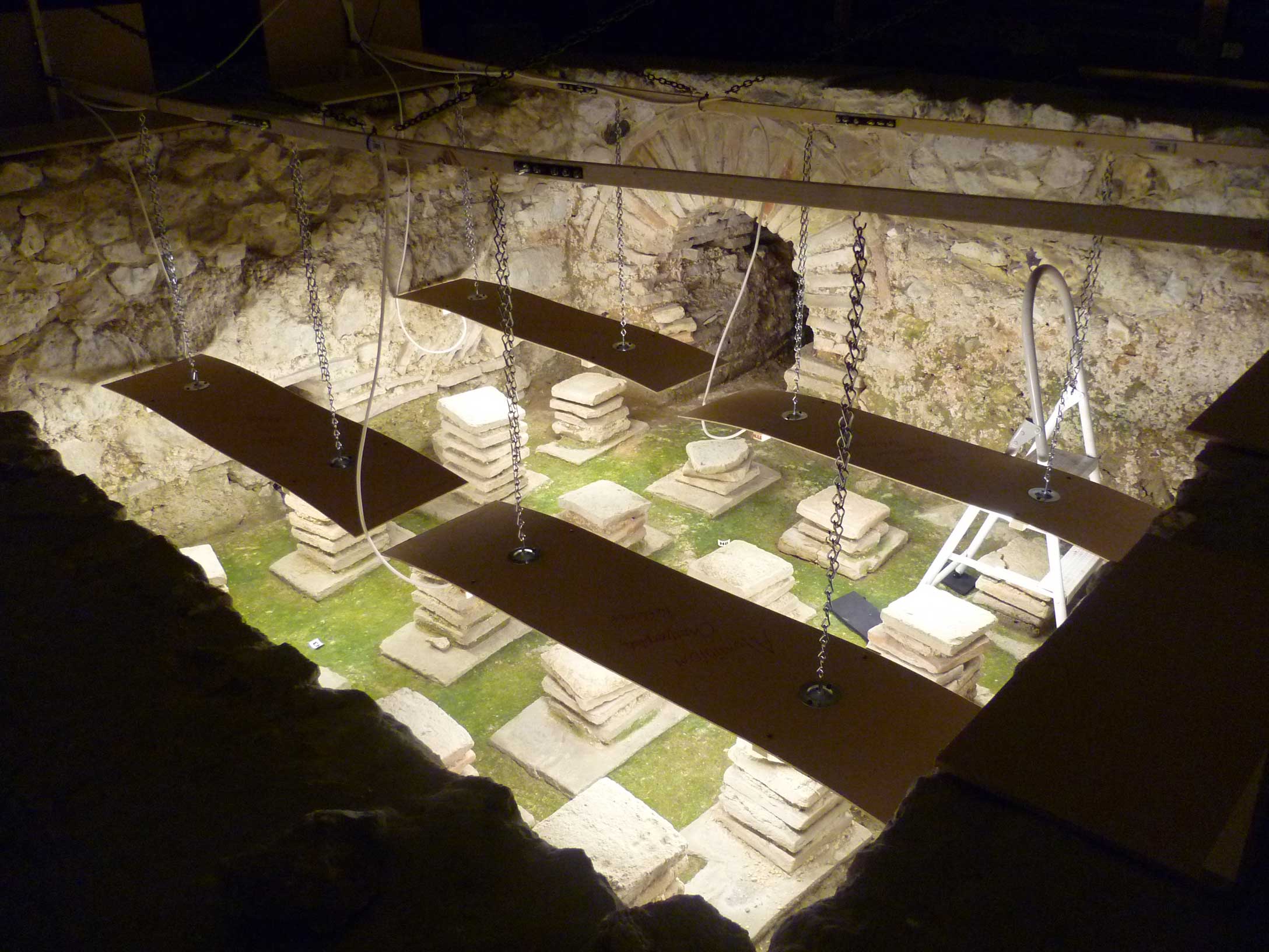 UVC Irradiation equipment suspended above preserved remains of a Roman Villa.
