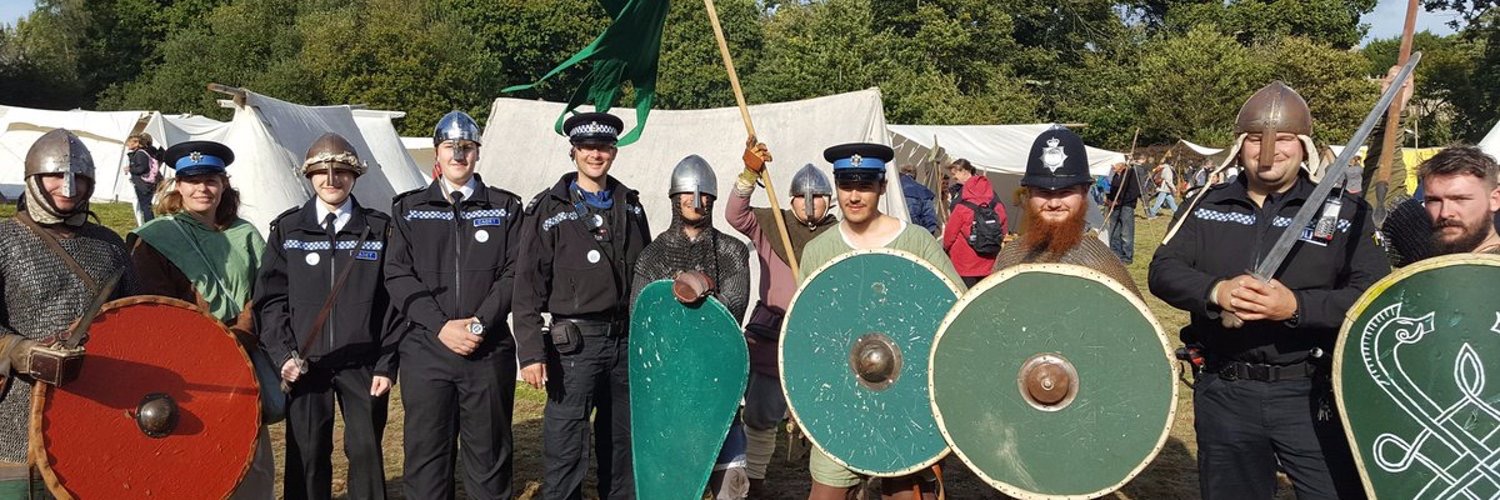 Image of police engaging with a re-enactment group dressed in Anglo-Saxon costume.