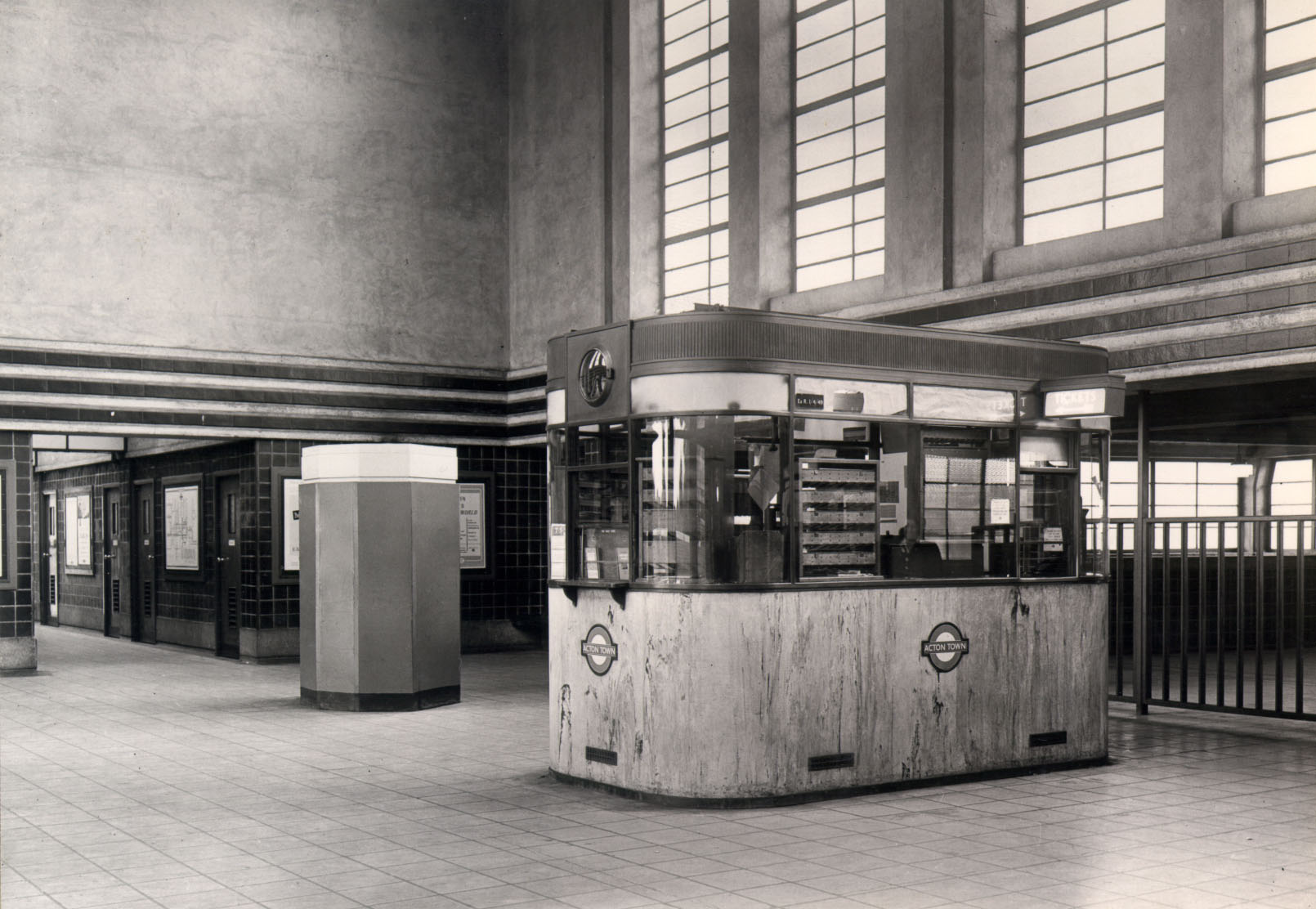 Black and white photo of Acton Town Underground Station ticket booth.