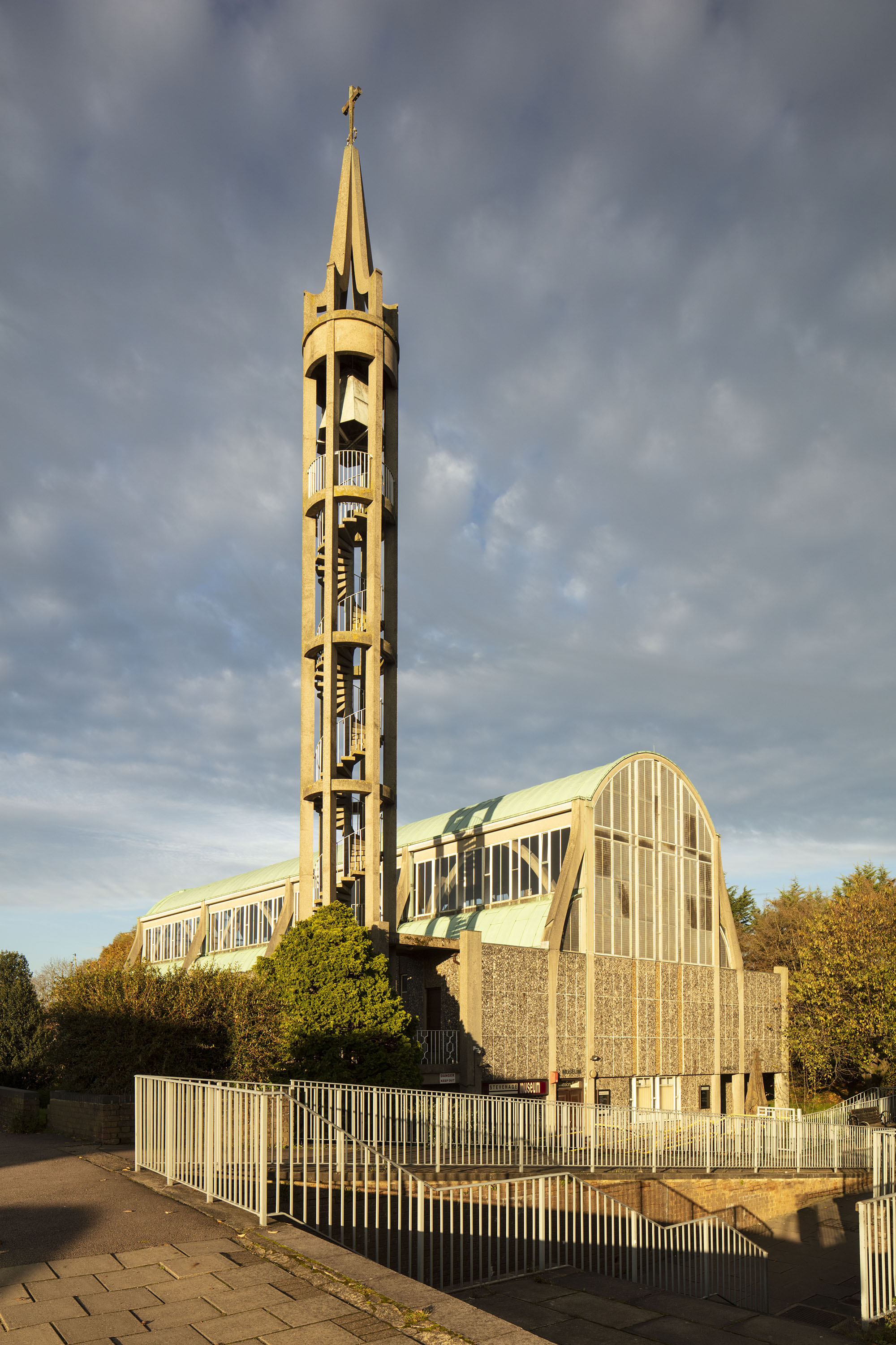 Modern church with open bell tower where the spiral staircase is visible