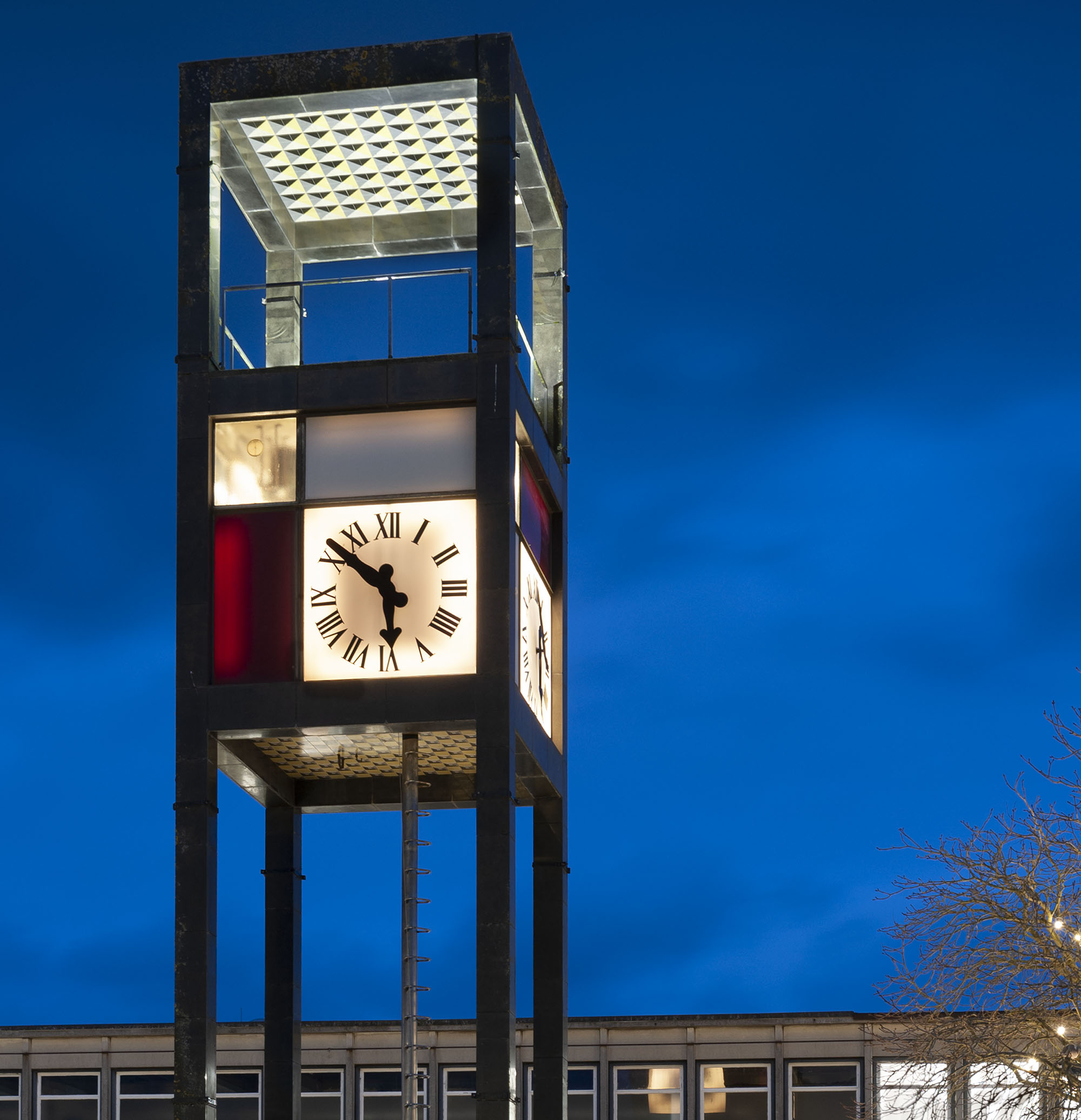 An illuminated clock tower at night