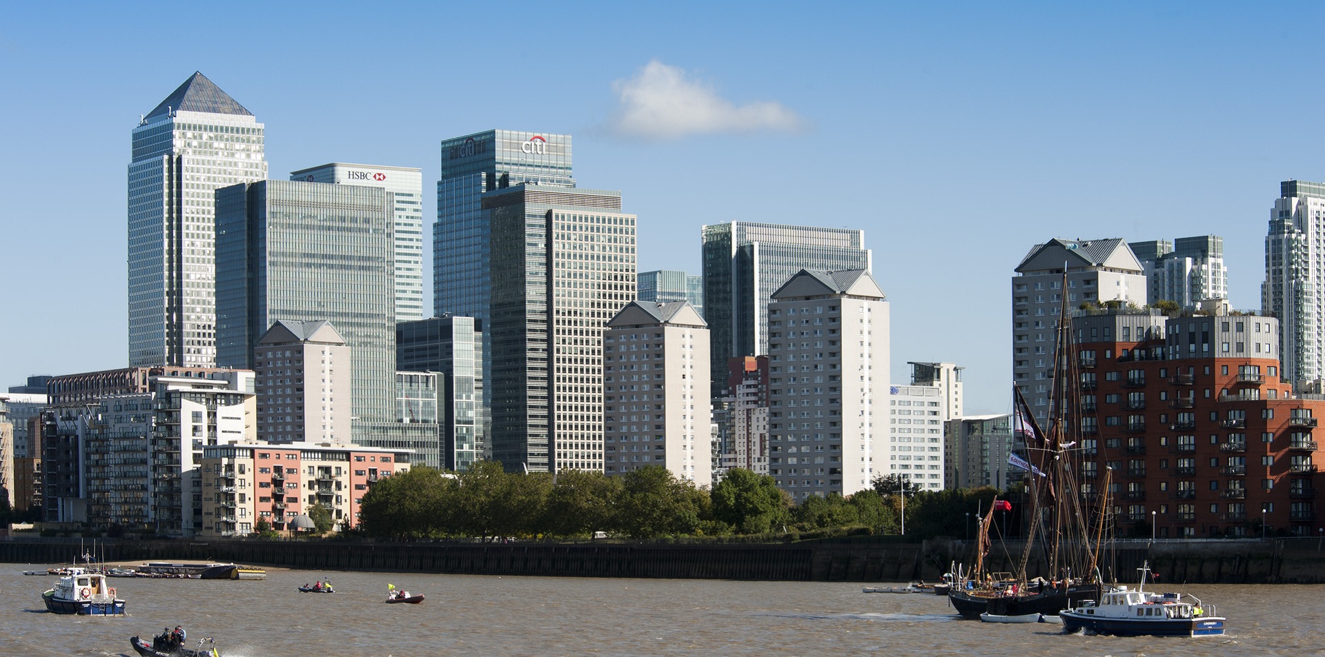 View of Canary Wharf with the Thames in the foreground