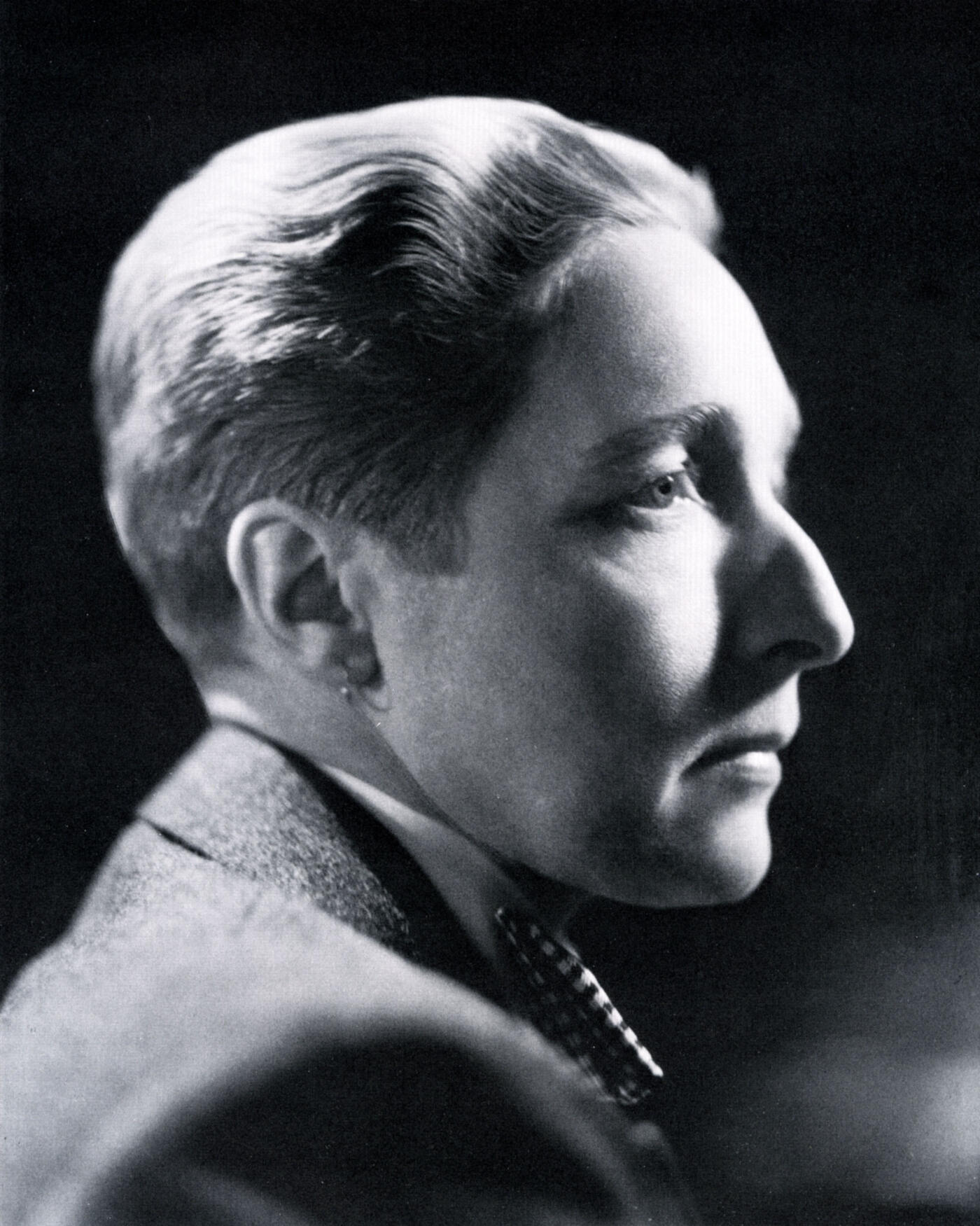 Black and white photo of Radclyffe Hall in profile