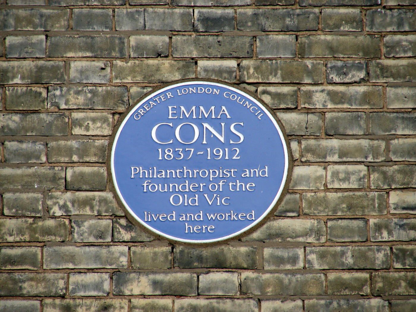 Blue plaque on wall commemorating Emma Cons