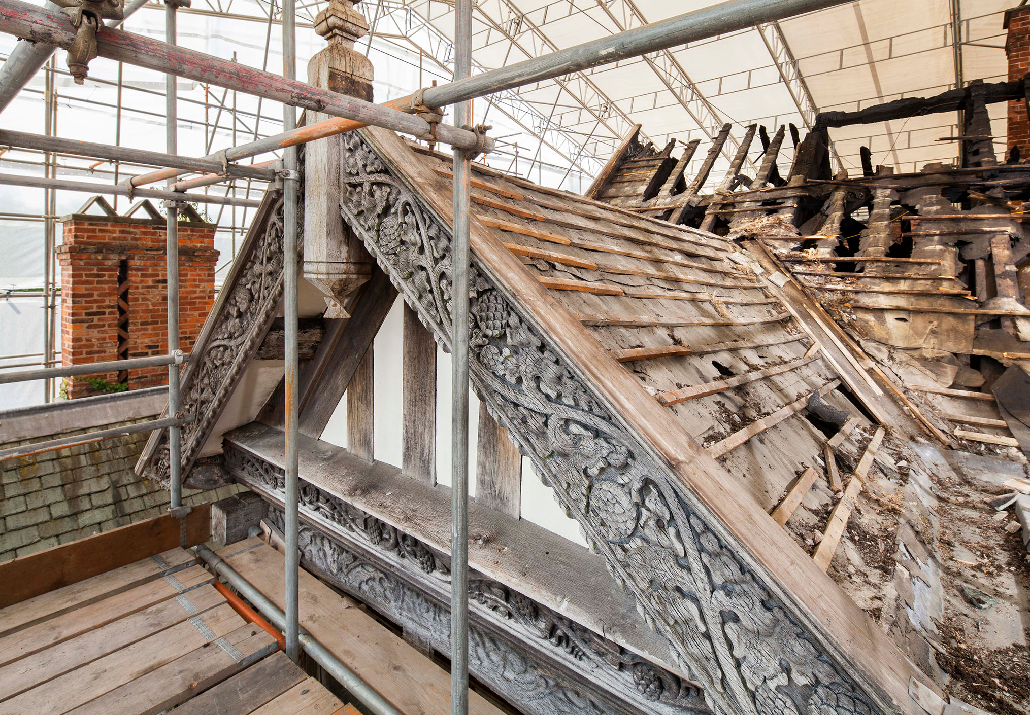 A view of decorated roof timbers at Grade II* listed Wythenshawe Hall, Manchester