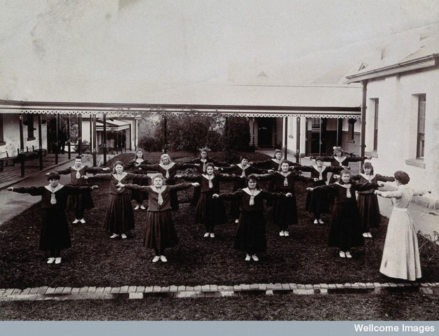 Metropolitan Lunatic Asylum, Kew: female patients exercising. 