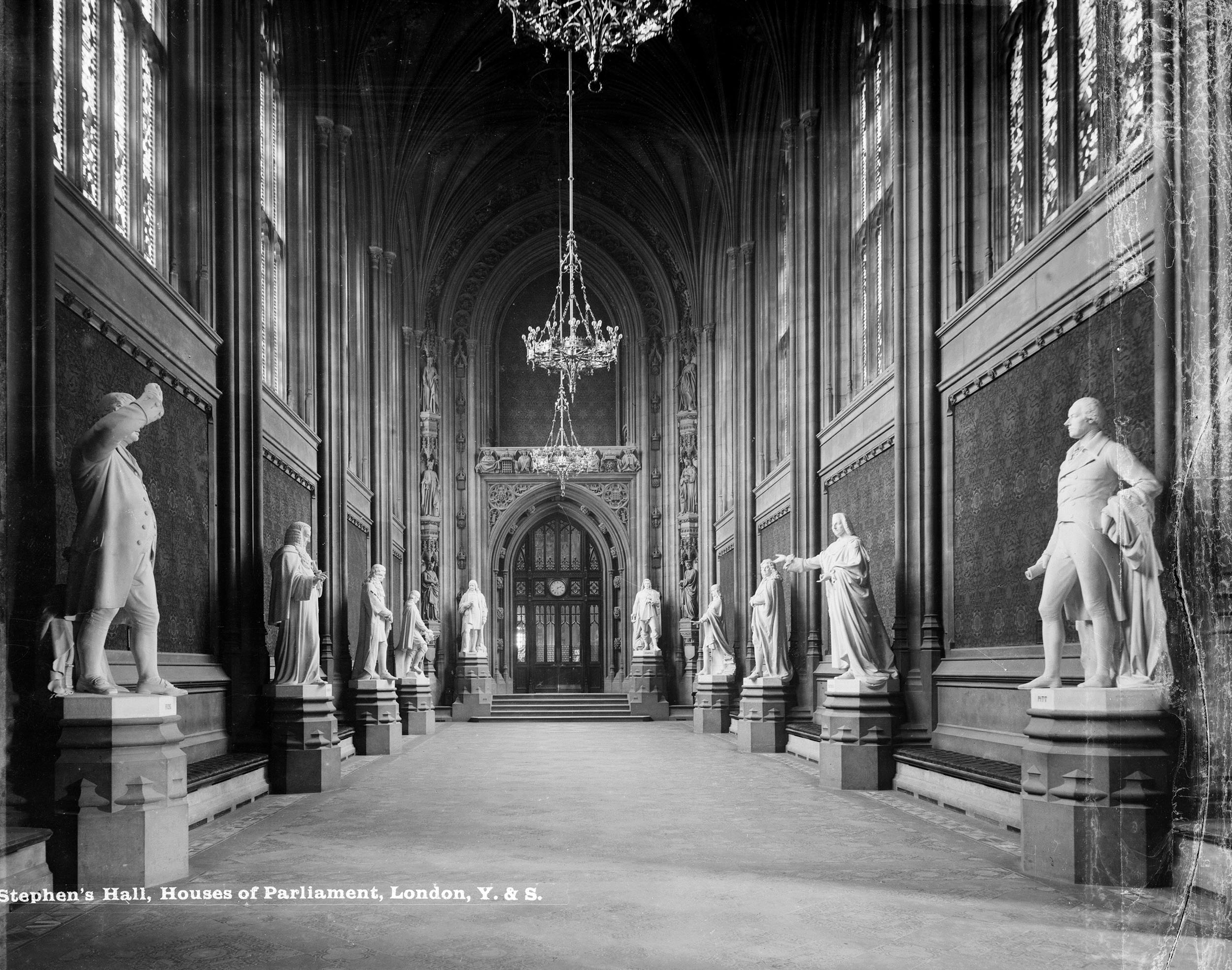 Photograph of the interior of St Stephen’s Hall in the Palace of Westminster, lined with statues of historic dignitaries