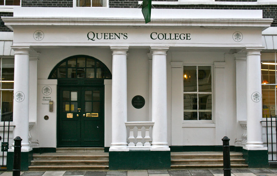 Queen's College entrance with a pair of stuccoed Doric columned porches added in the mid 19th century when in use as the school. Listed Grade II.
© Cheryl Law (2010). Source Historic England. NMR.