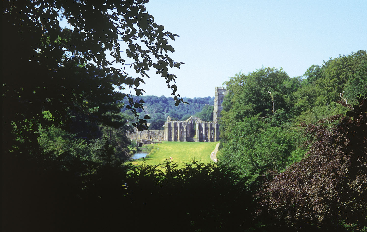 The ruins of Fountain Abbey as seen from the gardens of Studley Royal