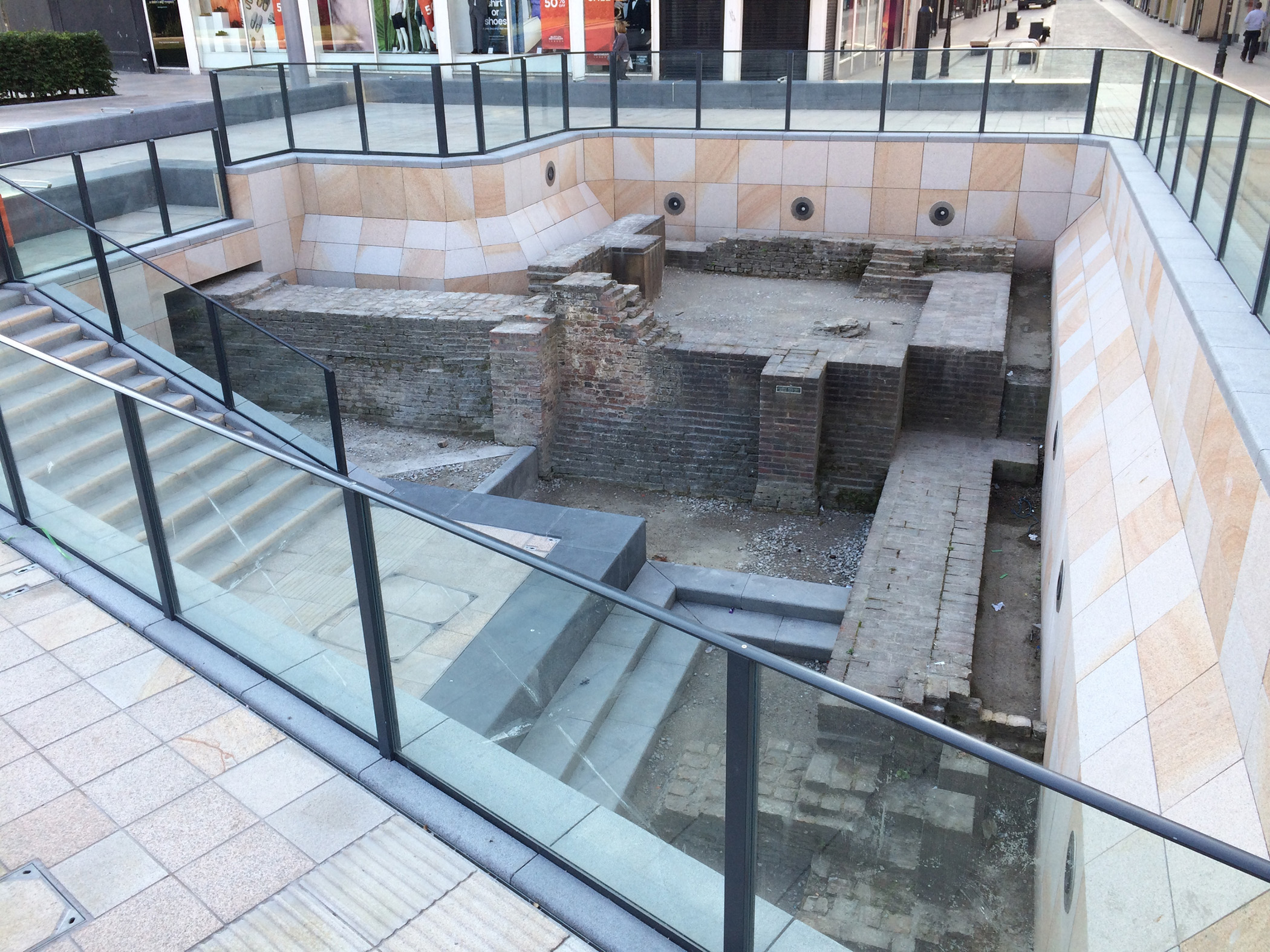 The site of Beverley Gate below ground level set in an open pedestrianised square