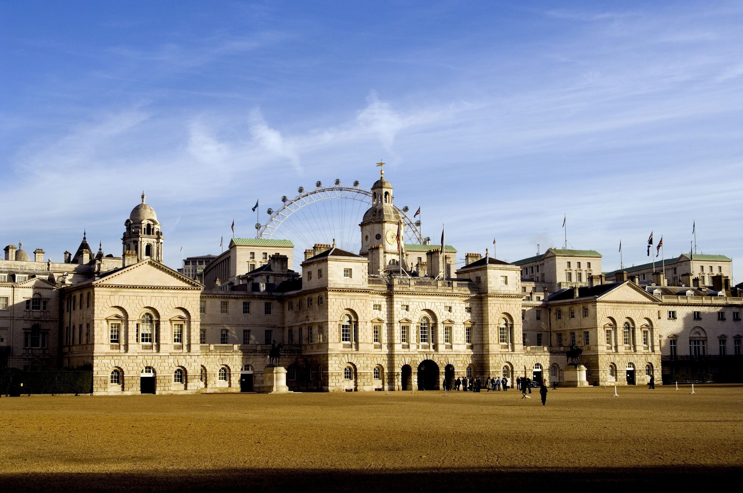 Image of Horse Guards Parade in Whitehall, designed 1745-48 by William Kent, built 1750-59 by John Vardy. The domed clock tower and lantern replicates a feature of the earlier horse guards on the same site.