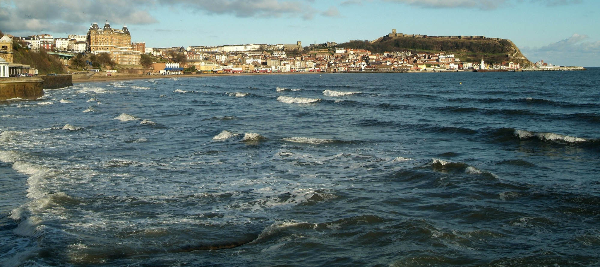 View across the water to the beach and the Grand Hotel, Scarborough, North Yorkshire
