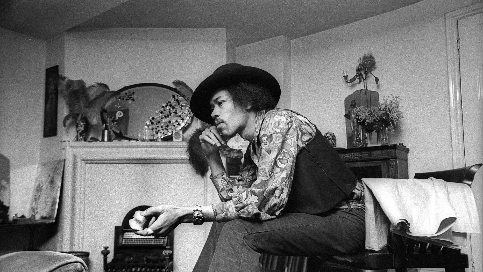 Jimi Hendrix in his apartment at number 23 Brook Street, London