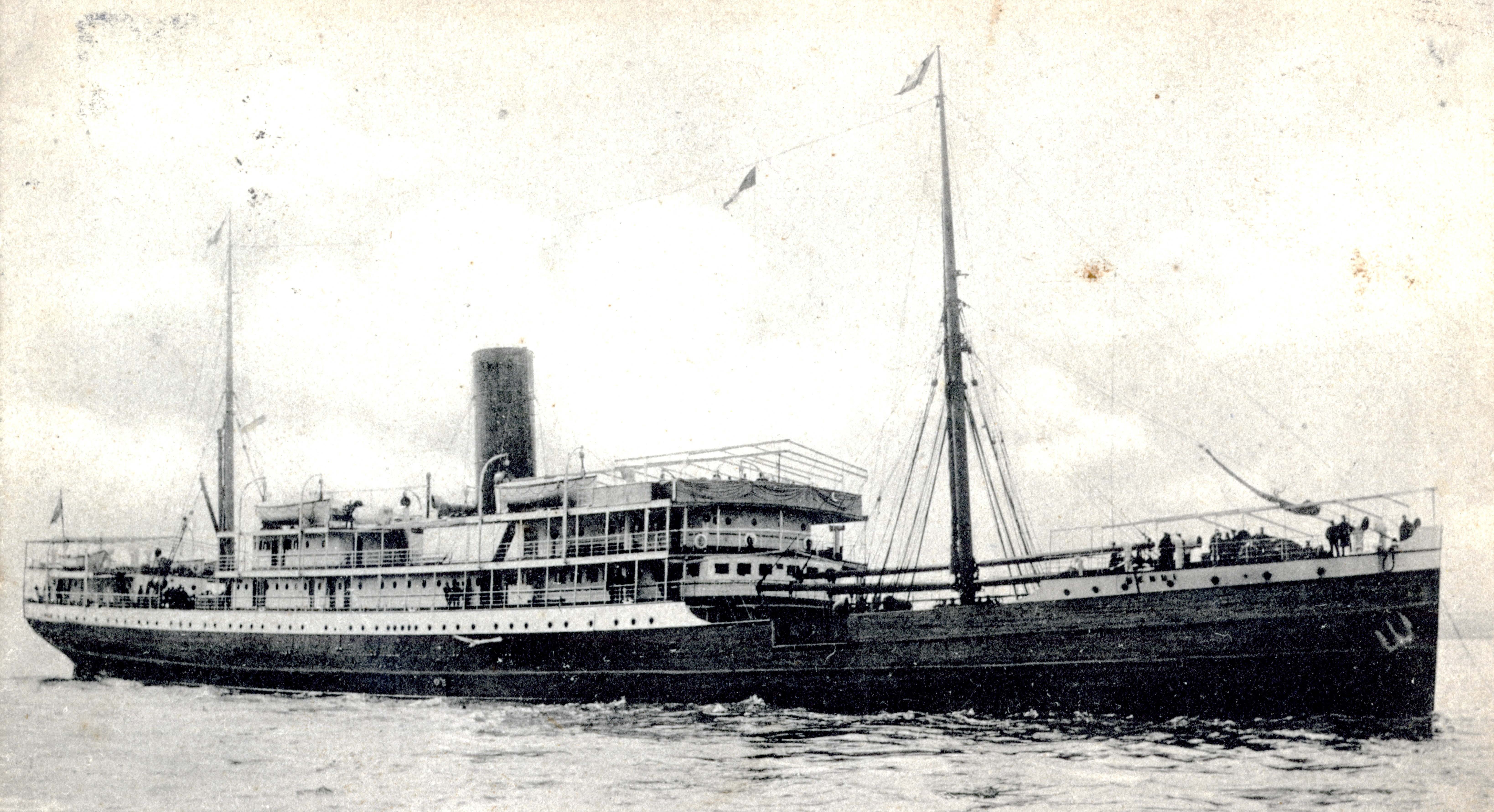 The Mendi was built in Glasgow and in 1905 registered to the British & African Steam Navigation Co Ltd. She is shown here in pre-war days in use as a mail ship. Image courtesy of the John Gribble Collection
