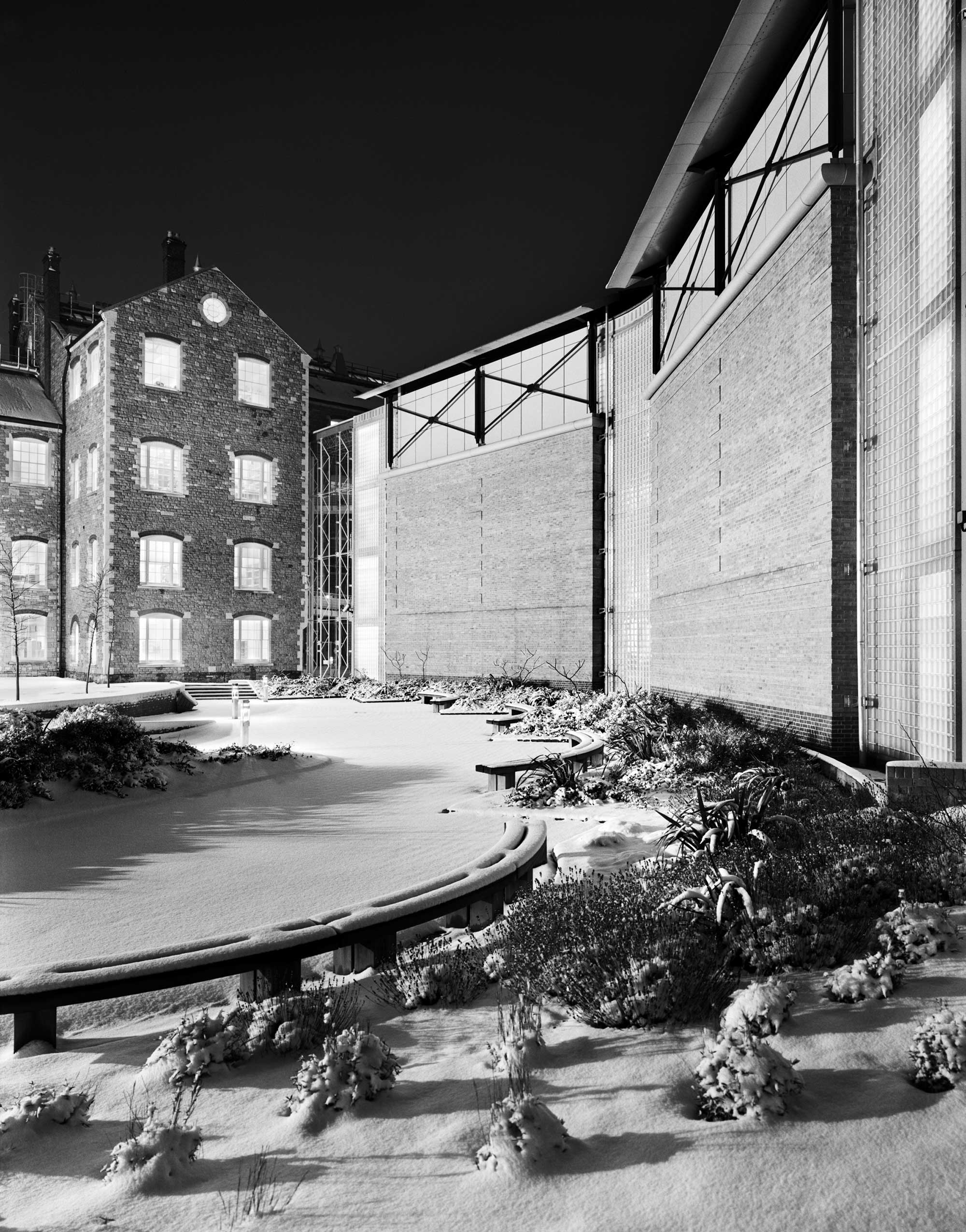 Black and white image of Historic England's Swindon office and Archive buildings in snow.