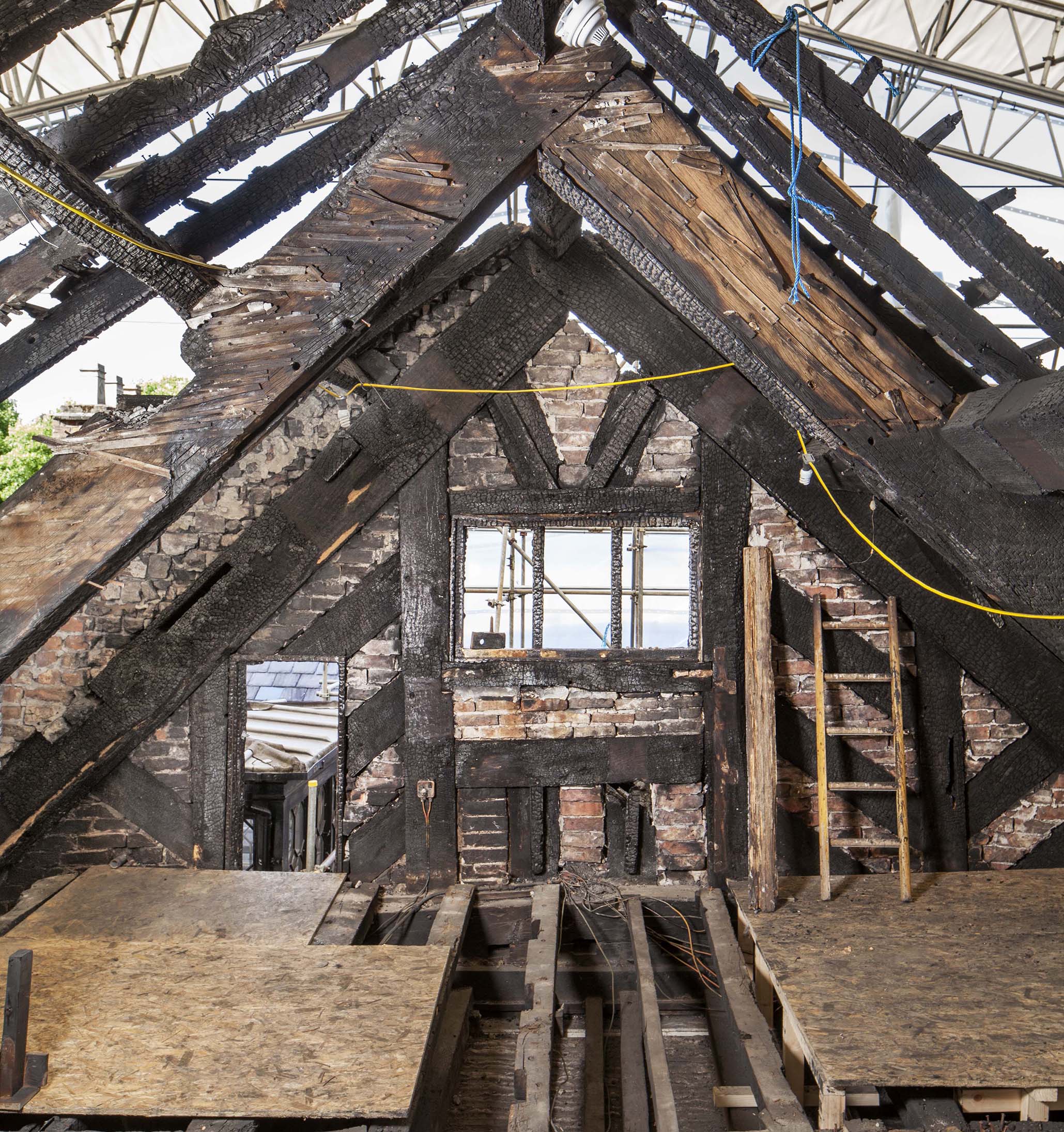 Fire damage up in the roof space of Wythenshawe Hall in Manchester.