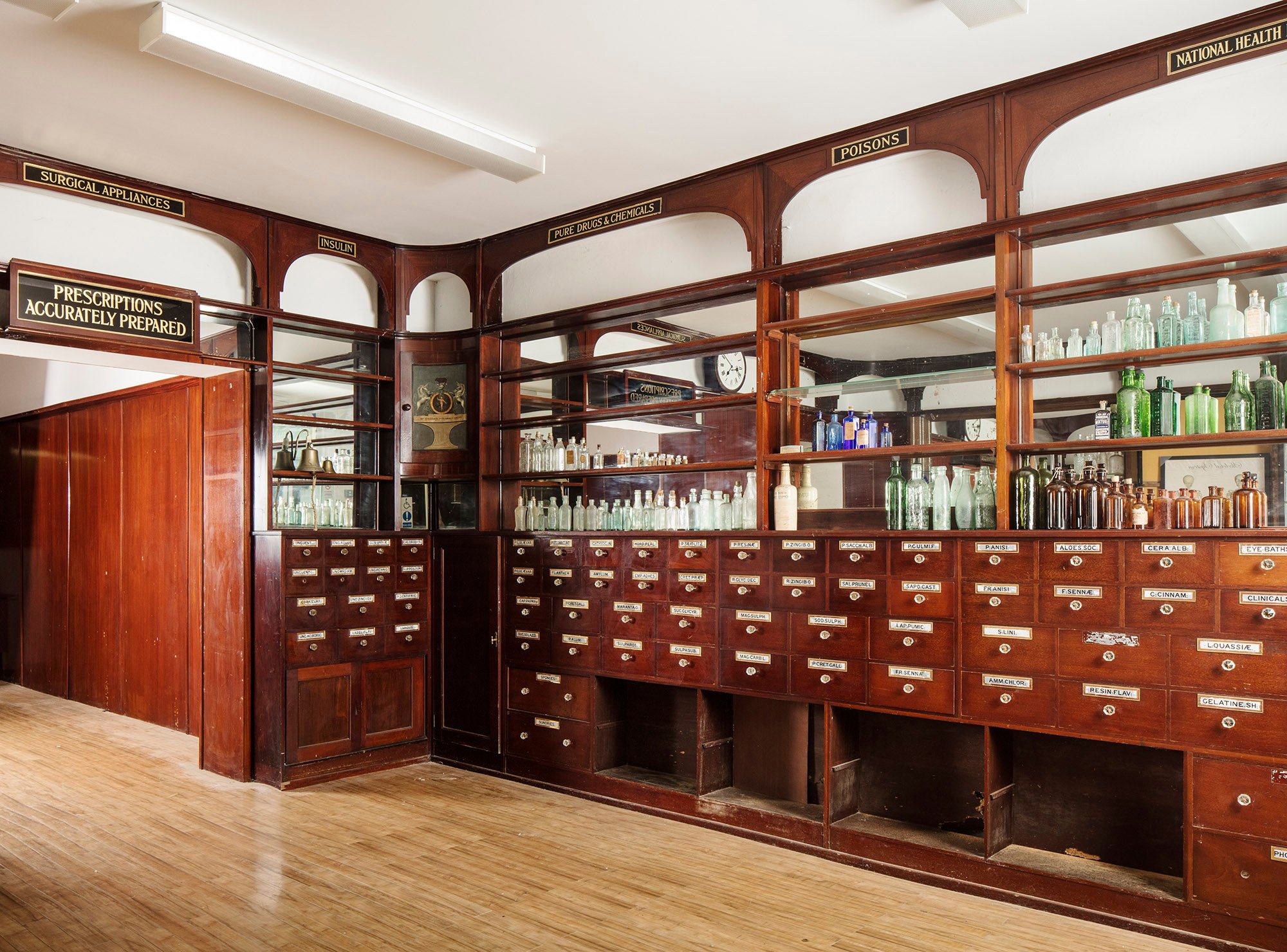 Interior of chemist shop with original drawers and shelves