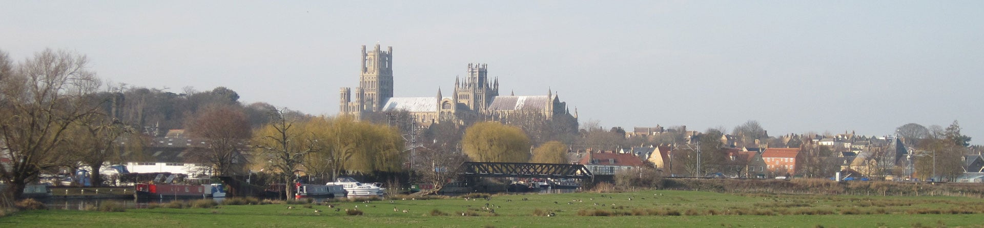 Ely Cathedral and surrounding town photographed across fields