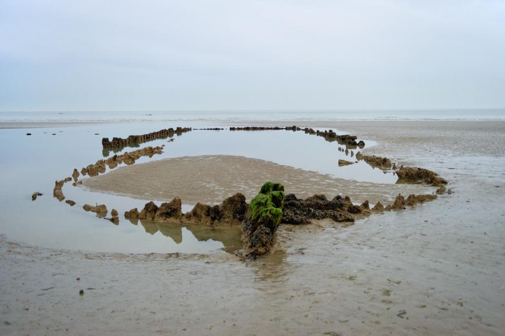 View of the protected wreck of the 'Amsterdam' in shallow water, St Leonards on Sea.