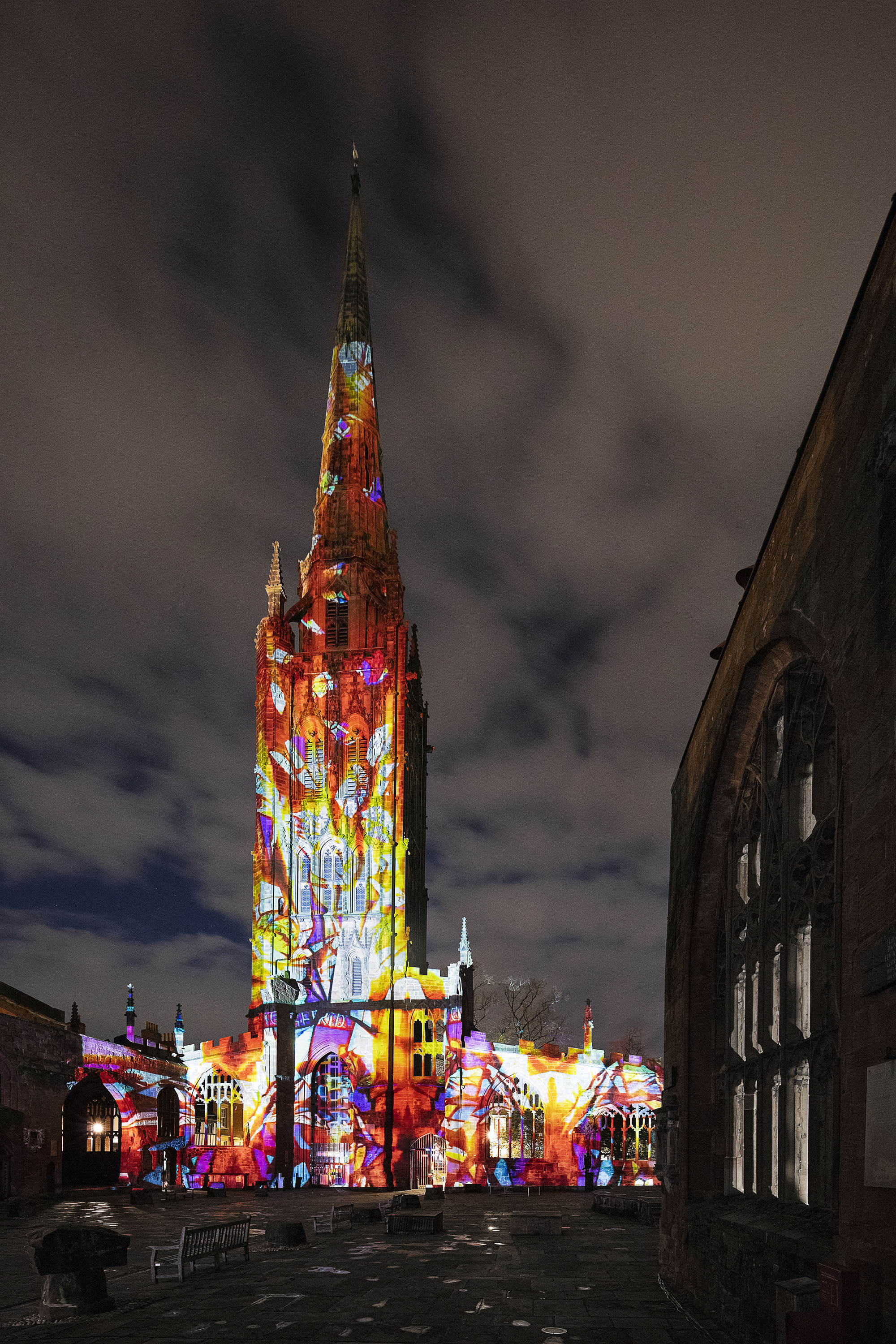 Multi-coloured image projected onto the cathedral building