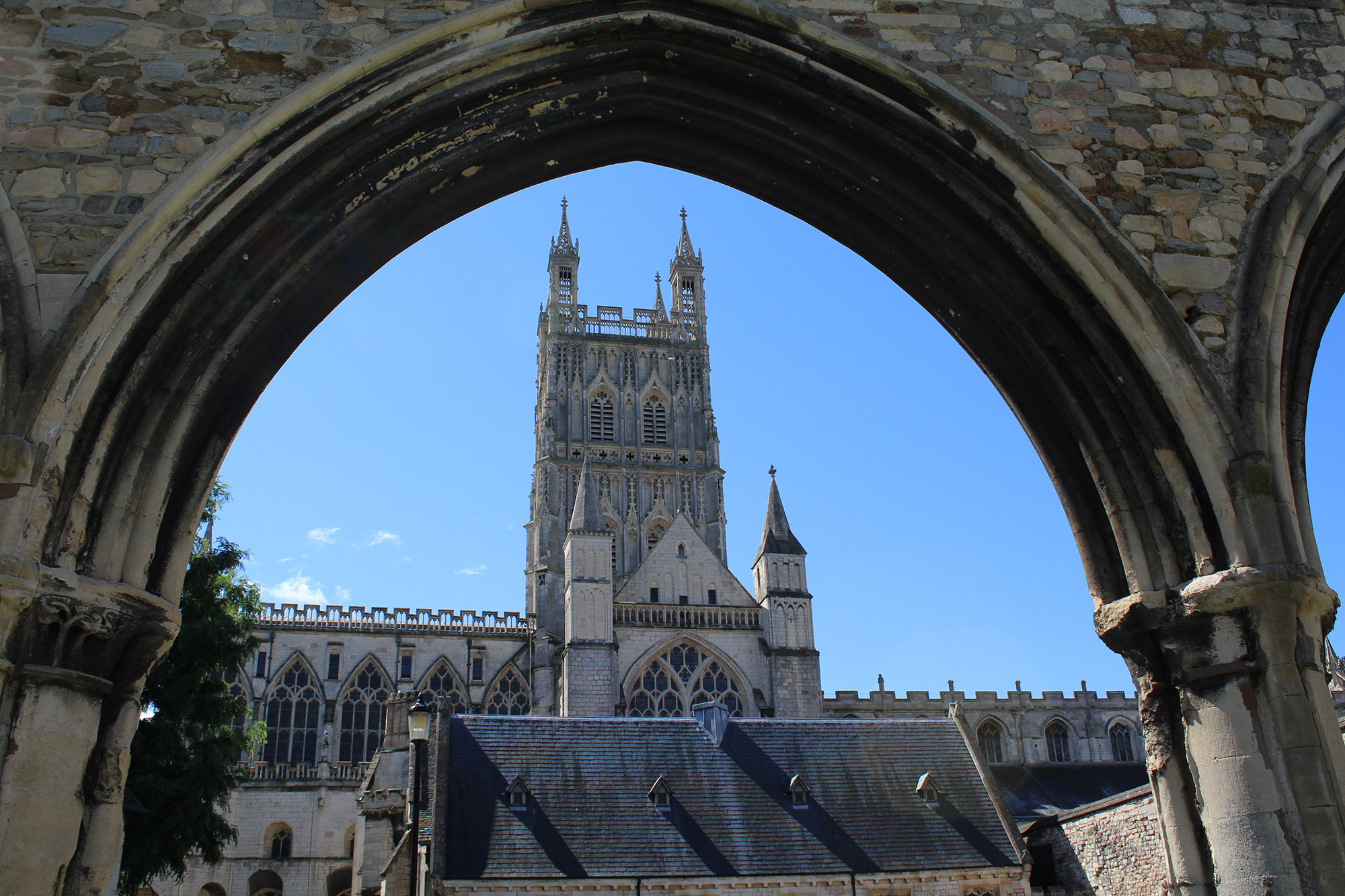 Photo of Gloucester Cathedral looking through an arch
