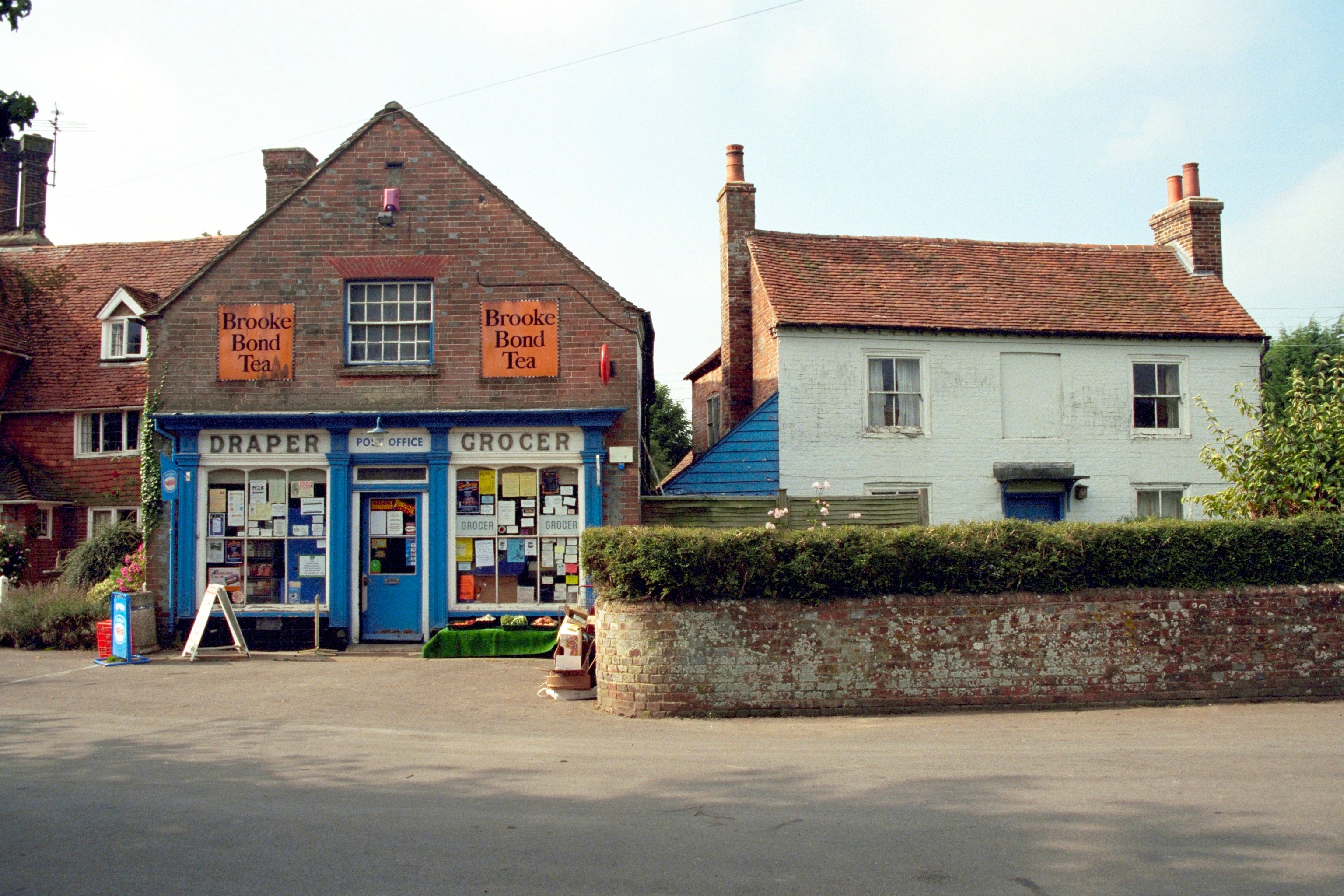 Colour photo of a rural shop and post office in village of Chiddingly, East Sussex.