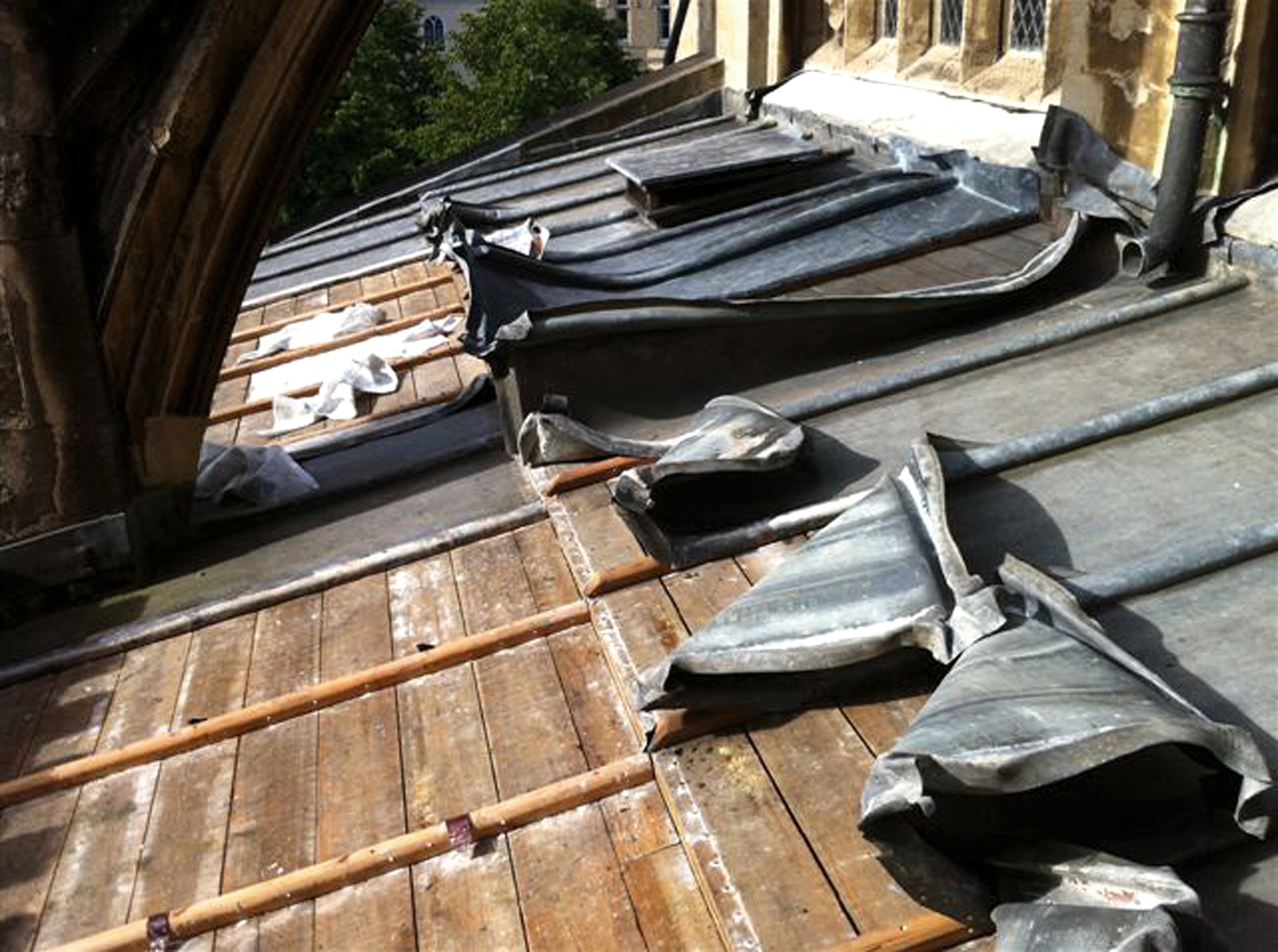 Image of the damage caused by metal theft from the roof of a historic place of worship.