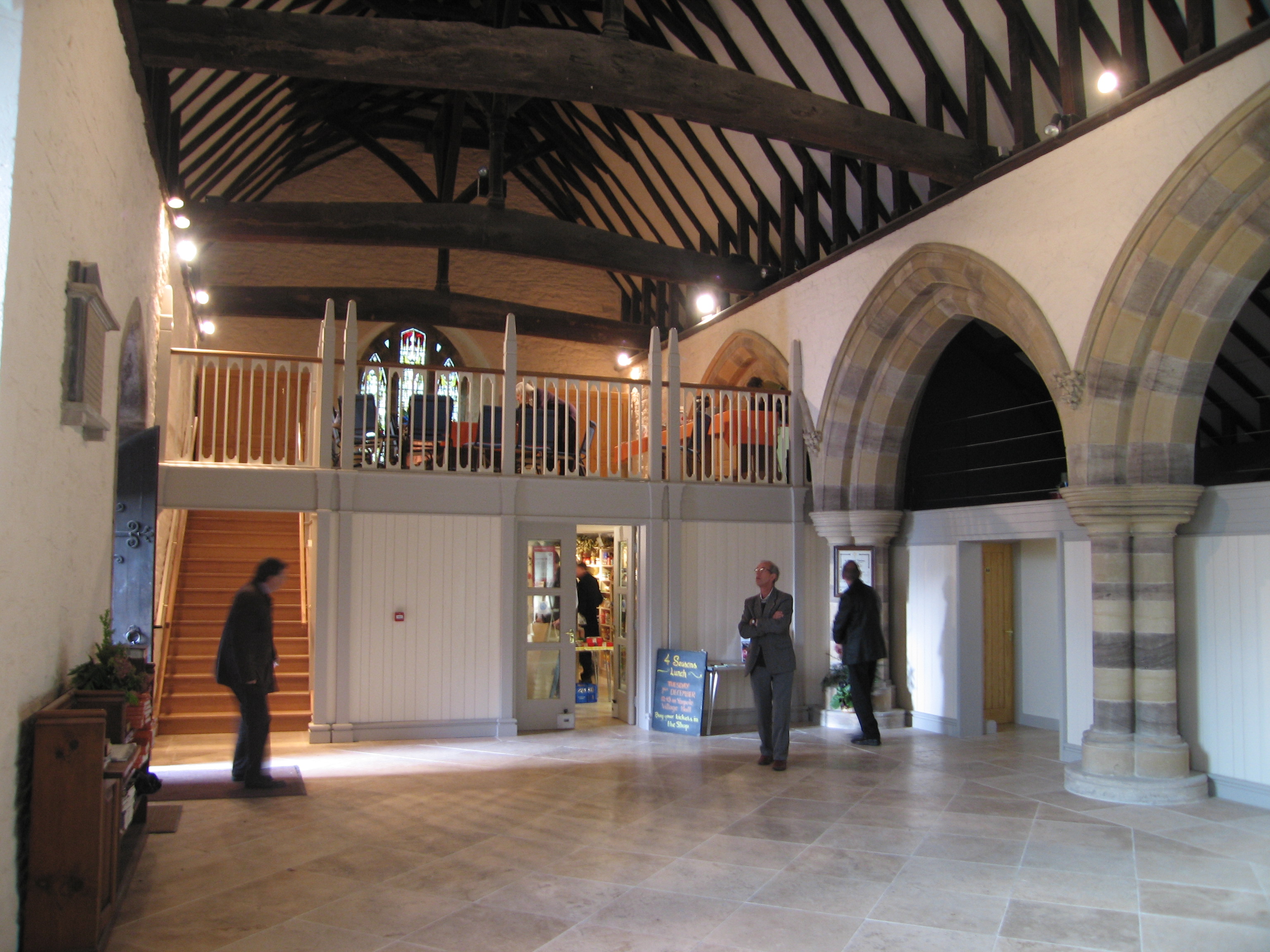 Interior of a church in Yarpole where a gallery and shop have been added and the space made more flexible.