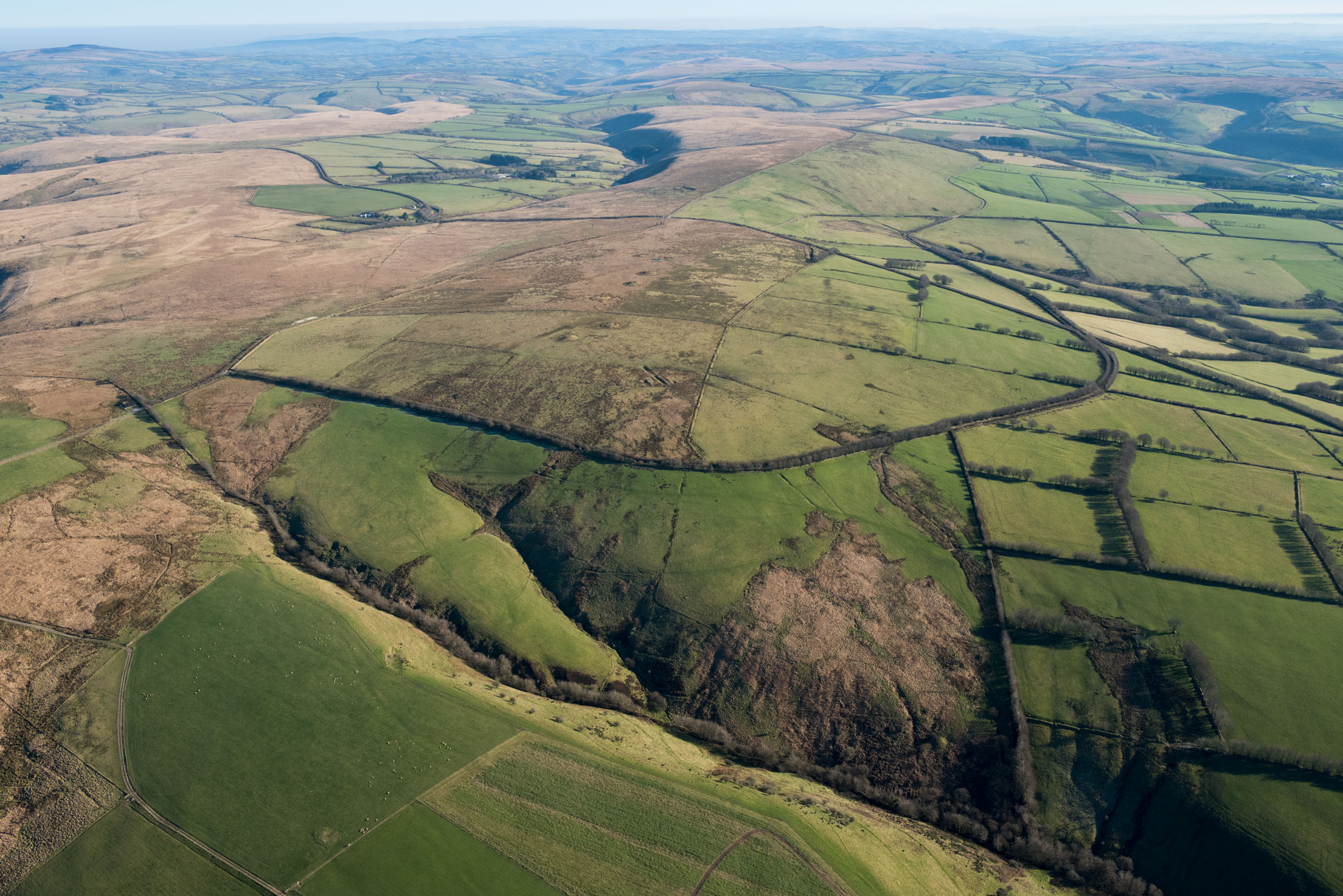 An aerial view of a moorland landscape.
