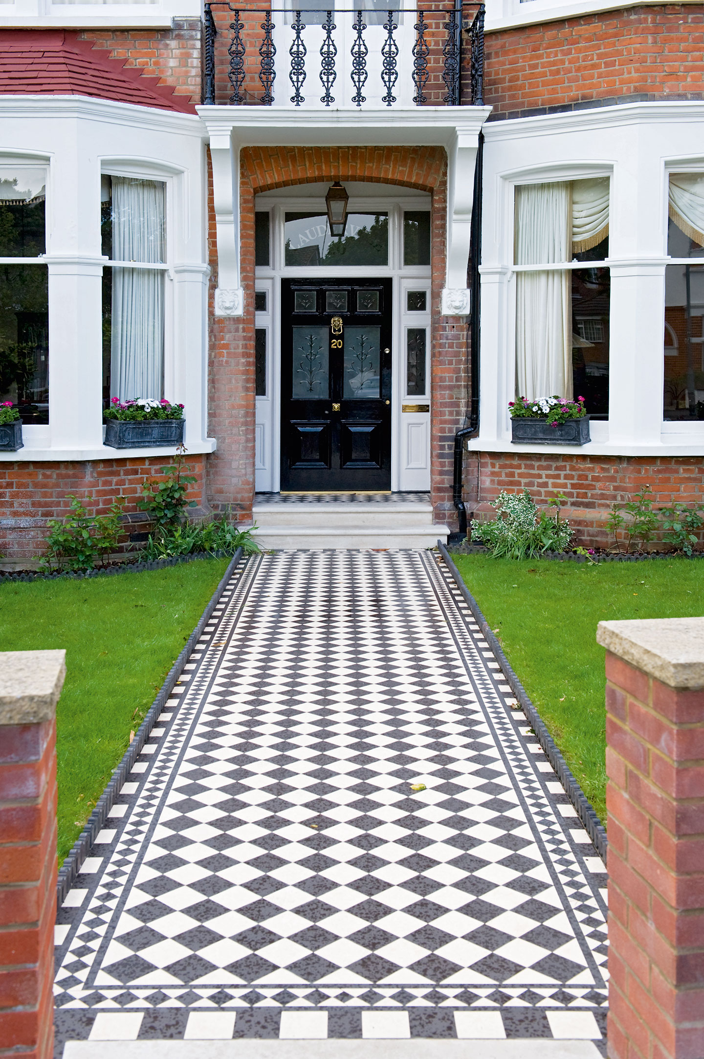 A Victorian geometric tiled pathway.