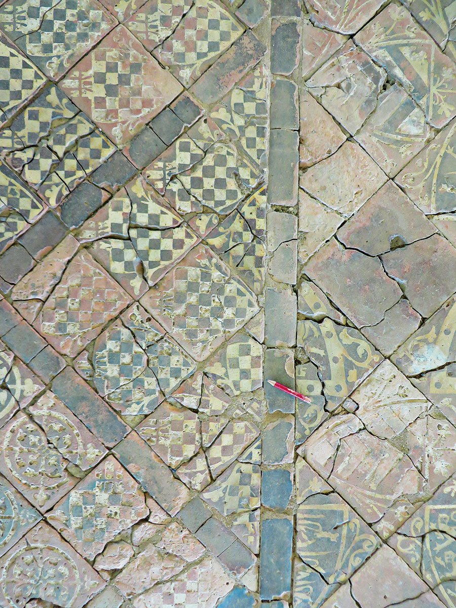 Fractured pavement tiles at Cleeve Abbey, Somerset.