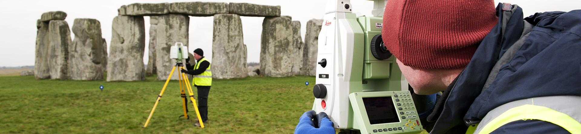 surveying standing stones at Stonehenge, Wilts