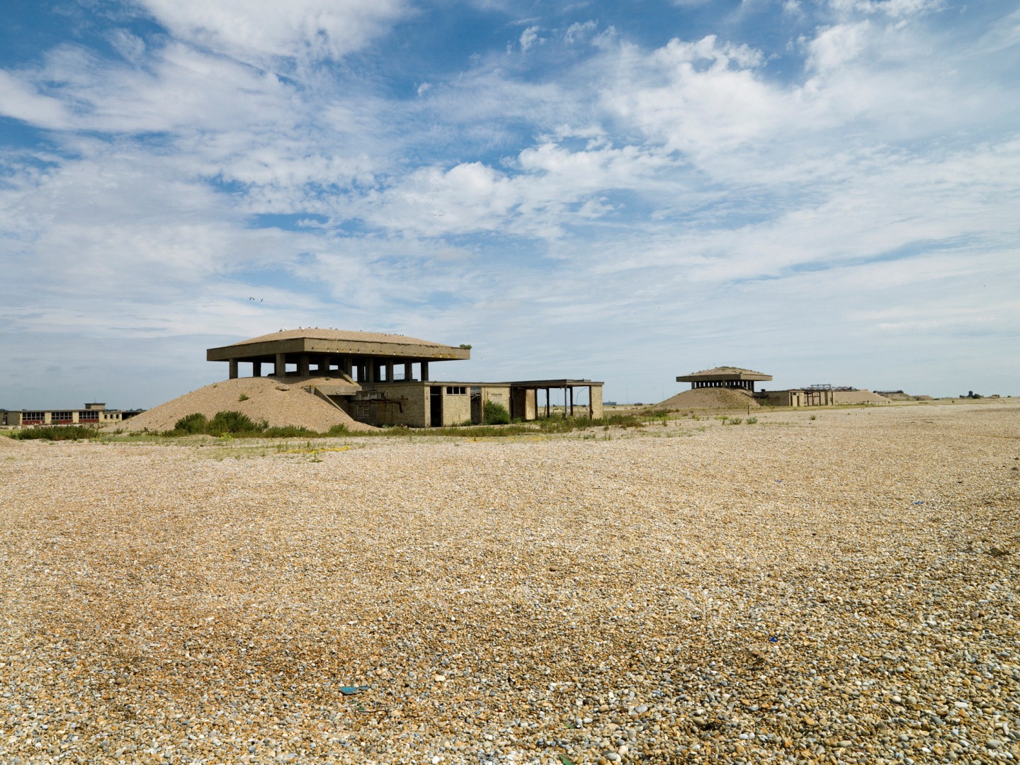 Atomic Weapons Research Establishment, Orford Ness, Suffolk, two 1960s test structures, known as the Pagodas, in the event of an explosion their roofs were designed to smoother the explosion, scheduled.