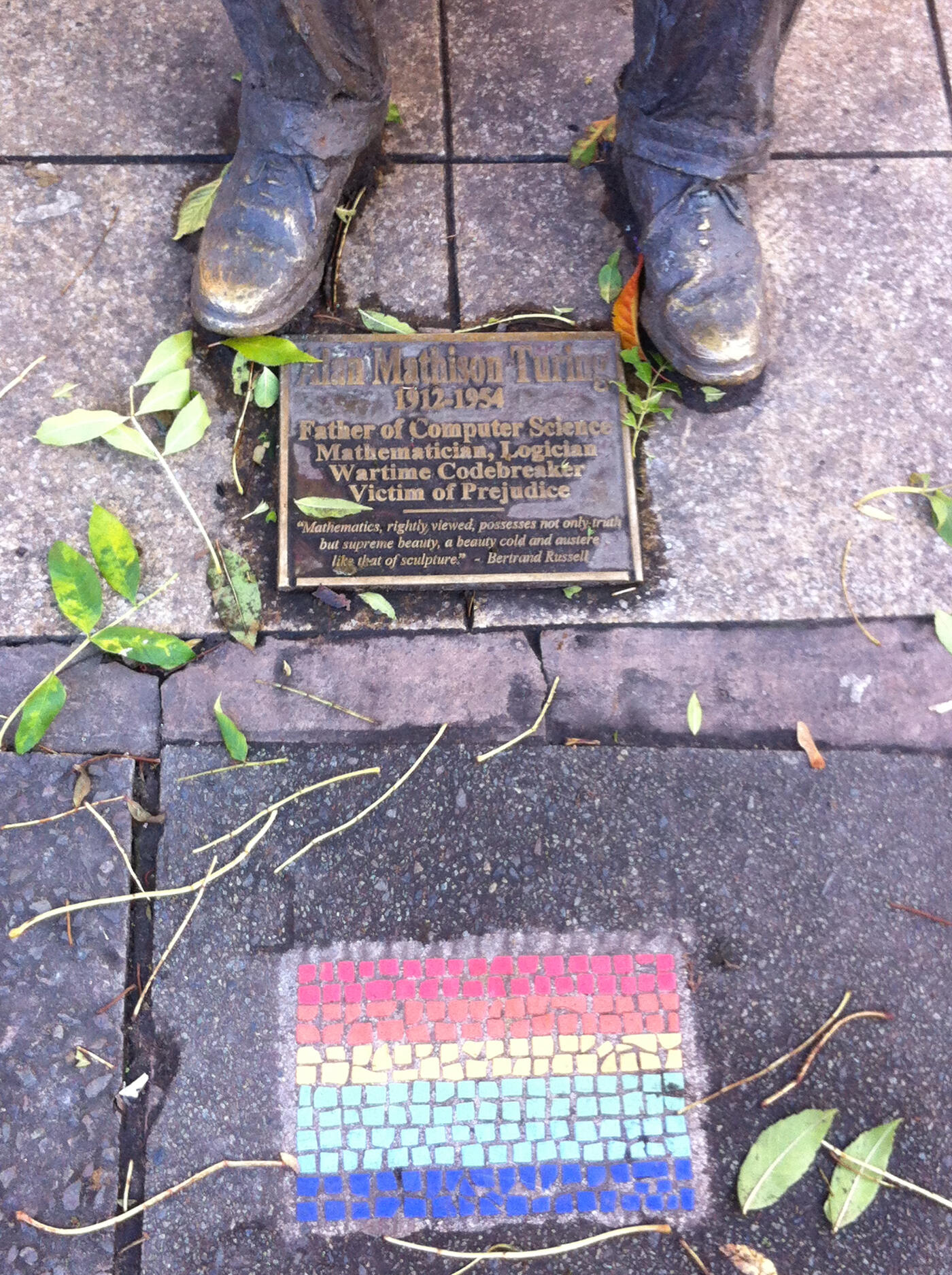 Plaques at the feet of the Alan Turing Memorial