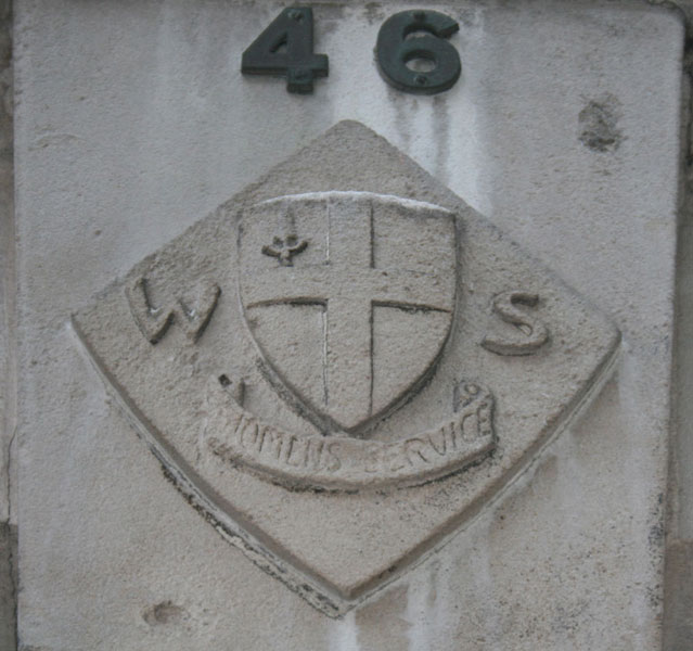 The logo of Women's Service at 46 Tufton Street to the rear of the Millicent Fawcett Hall 1929. © Cheryl Law (2010). Source Historic England. NMR.