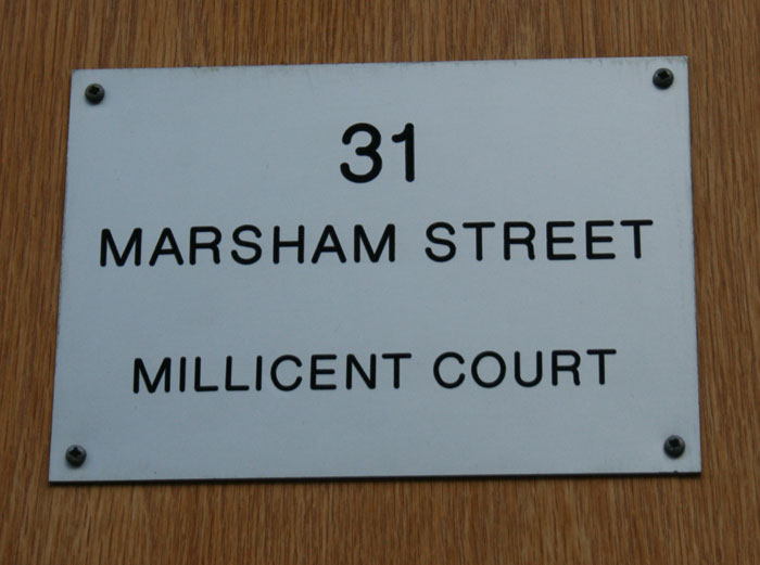 The nameplate to a block of flats built in 2000 around Millicent Fawcett Hall © Cheryl Law (2010). Source Historic England. NMR.