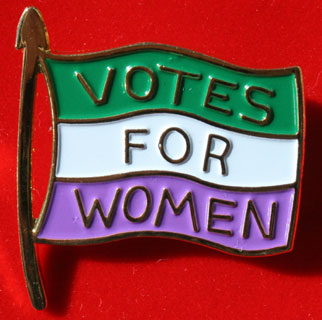 A replica 1909 Womens Social and Political Union badge in the Union colours