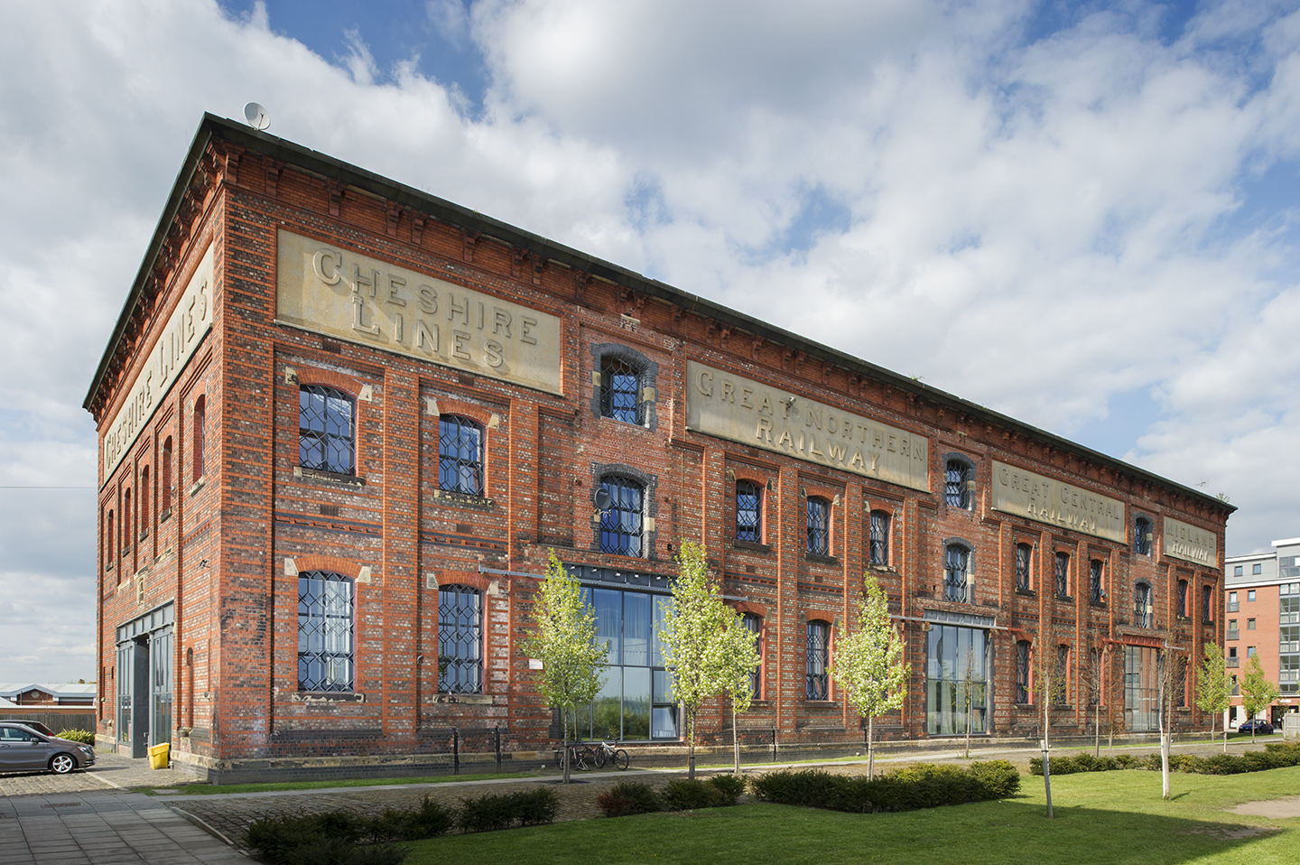 The Cheshire Lines Committee warehouse at Warrington (1897), made full use of the advertising possibilities offer on its façade to promote the three companies.