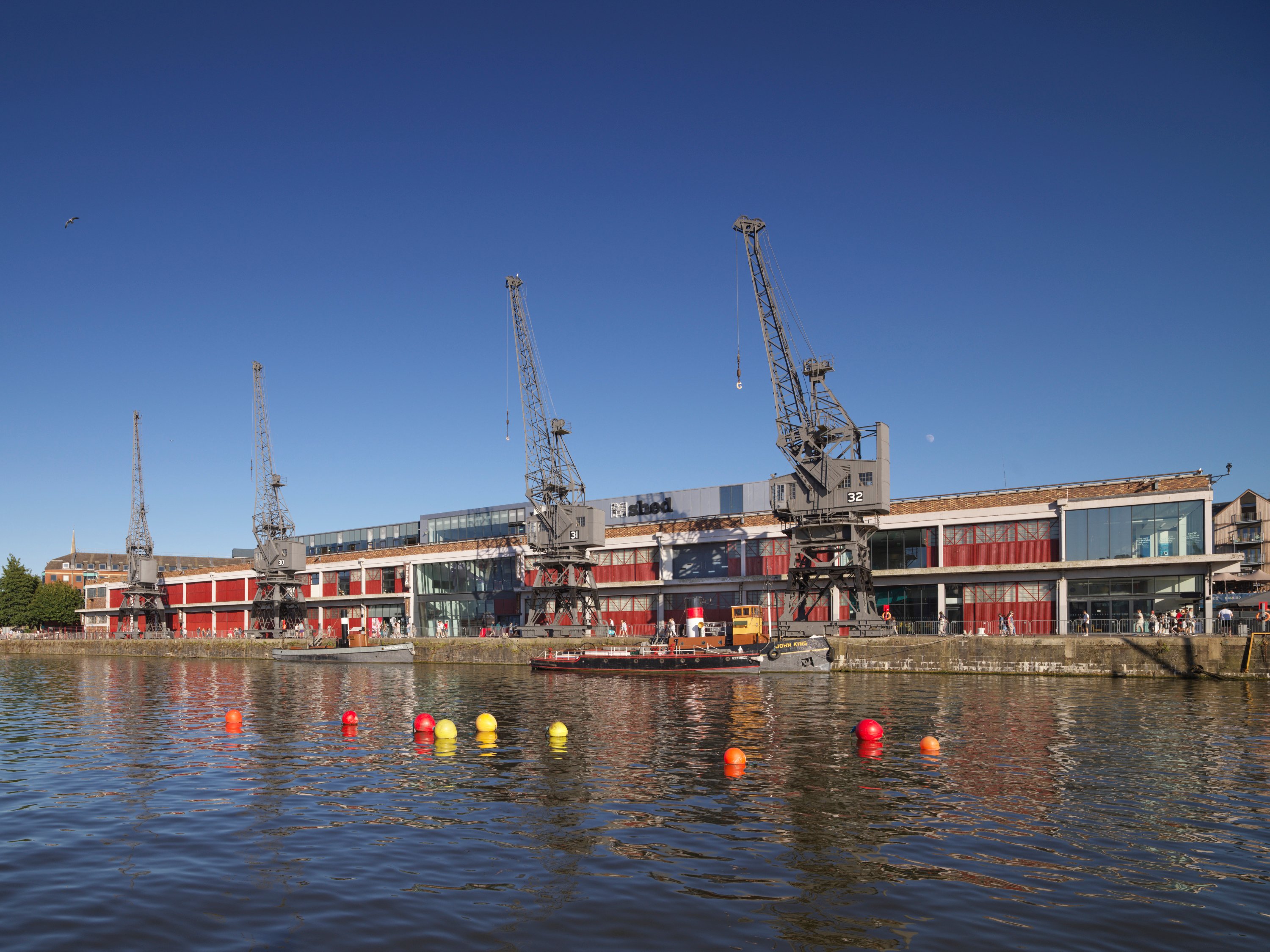 View from the north-west of travelling cranes 29, 30, 31 and 32 at Princes Wharf
