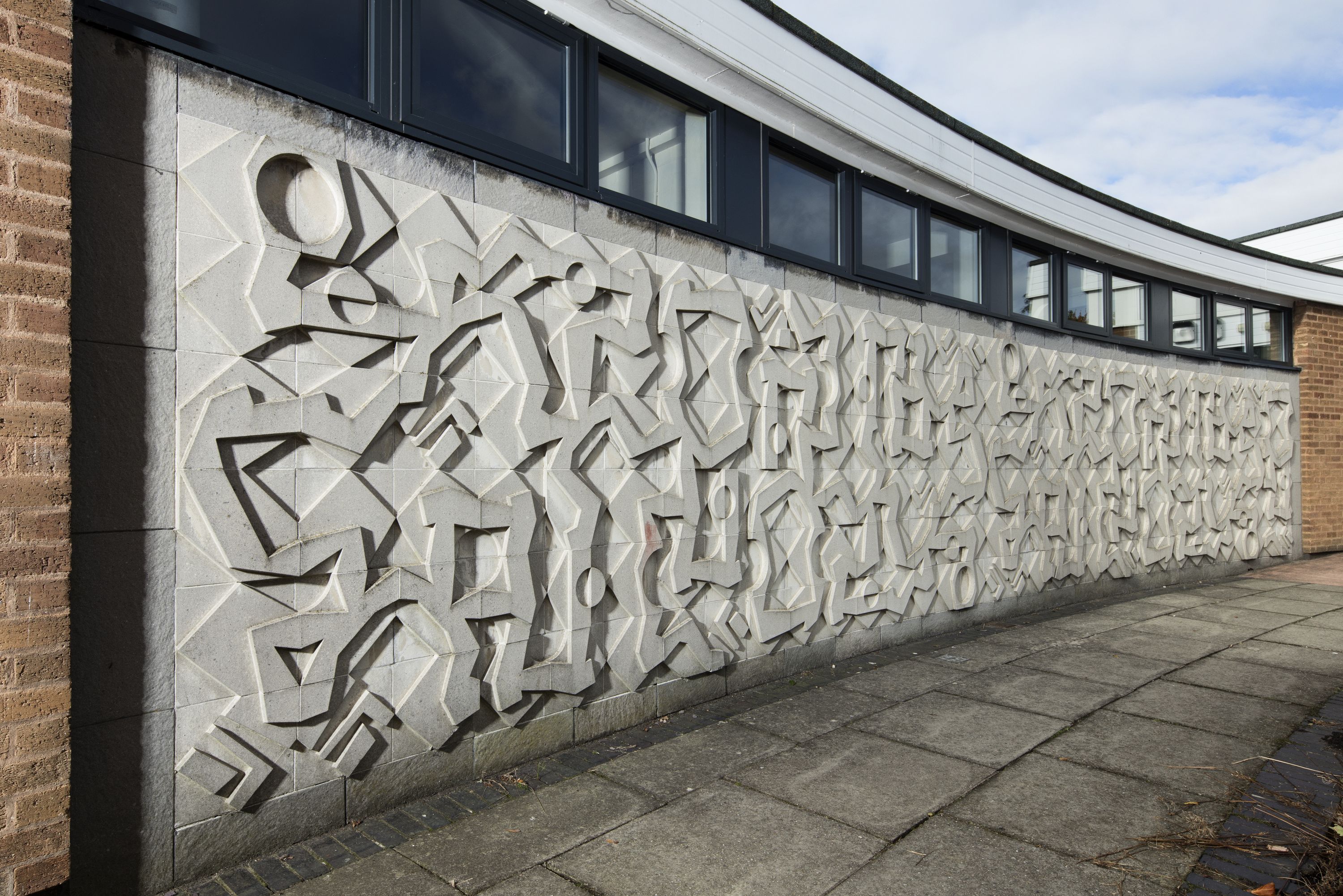 Artwork on an exterior wall of a school building