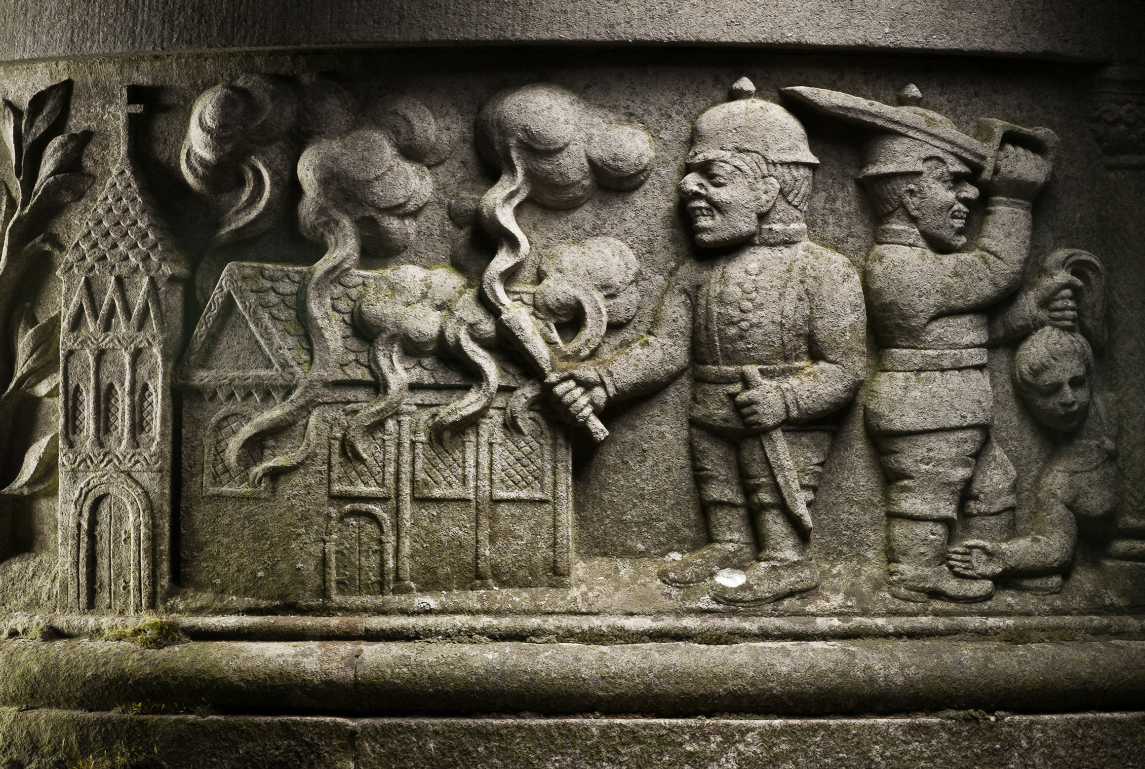Detail of the carvings on the Wagoners' War Memorial in Sledmere, Yorkshire, now upgraded to Grade I. The carvings describe the role of the Wgoners and depict some atrocities, supposedly committed by German soldiers.