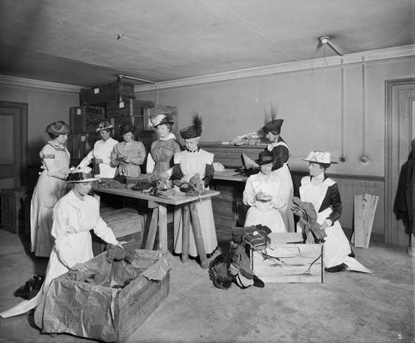 Women from the Canadian War Contingent packing socks for the troops