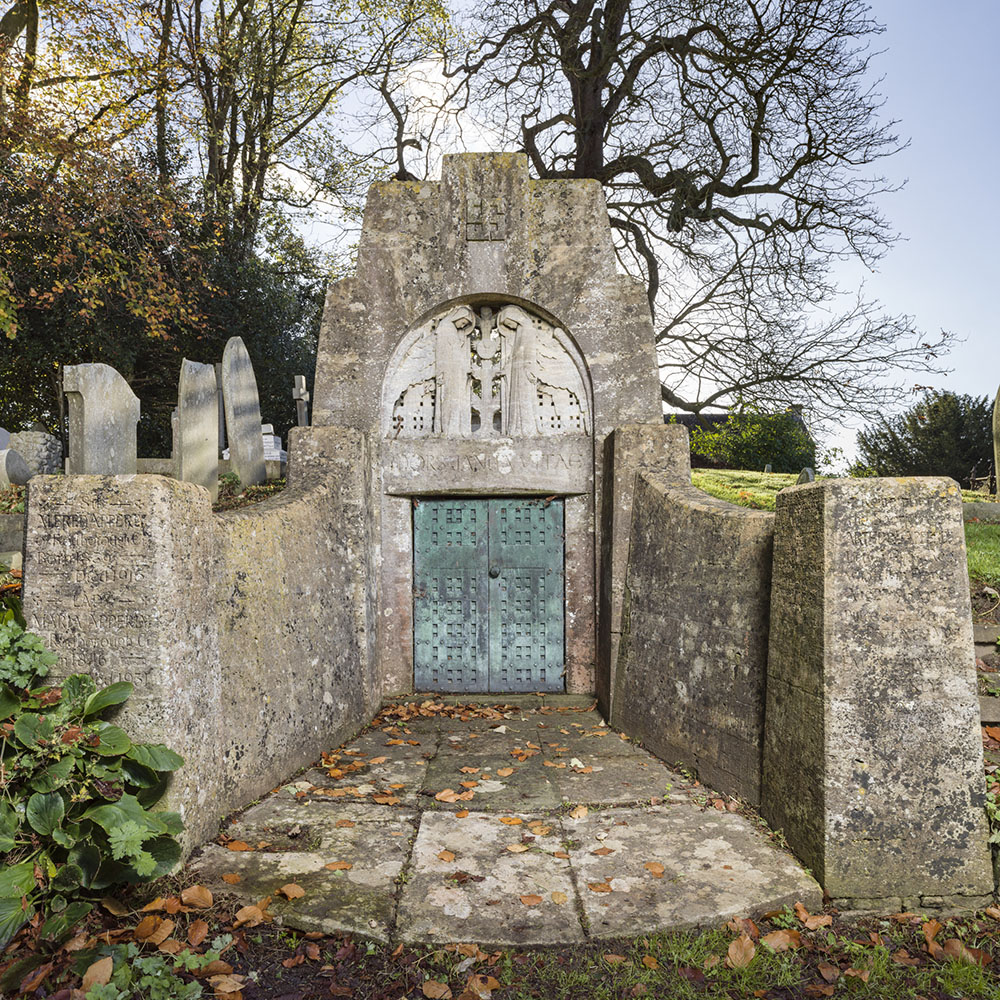 An Arts and Crafts style miniature mausoleum, constructed for a prominent local landowner and bearing the names of his family.