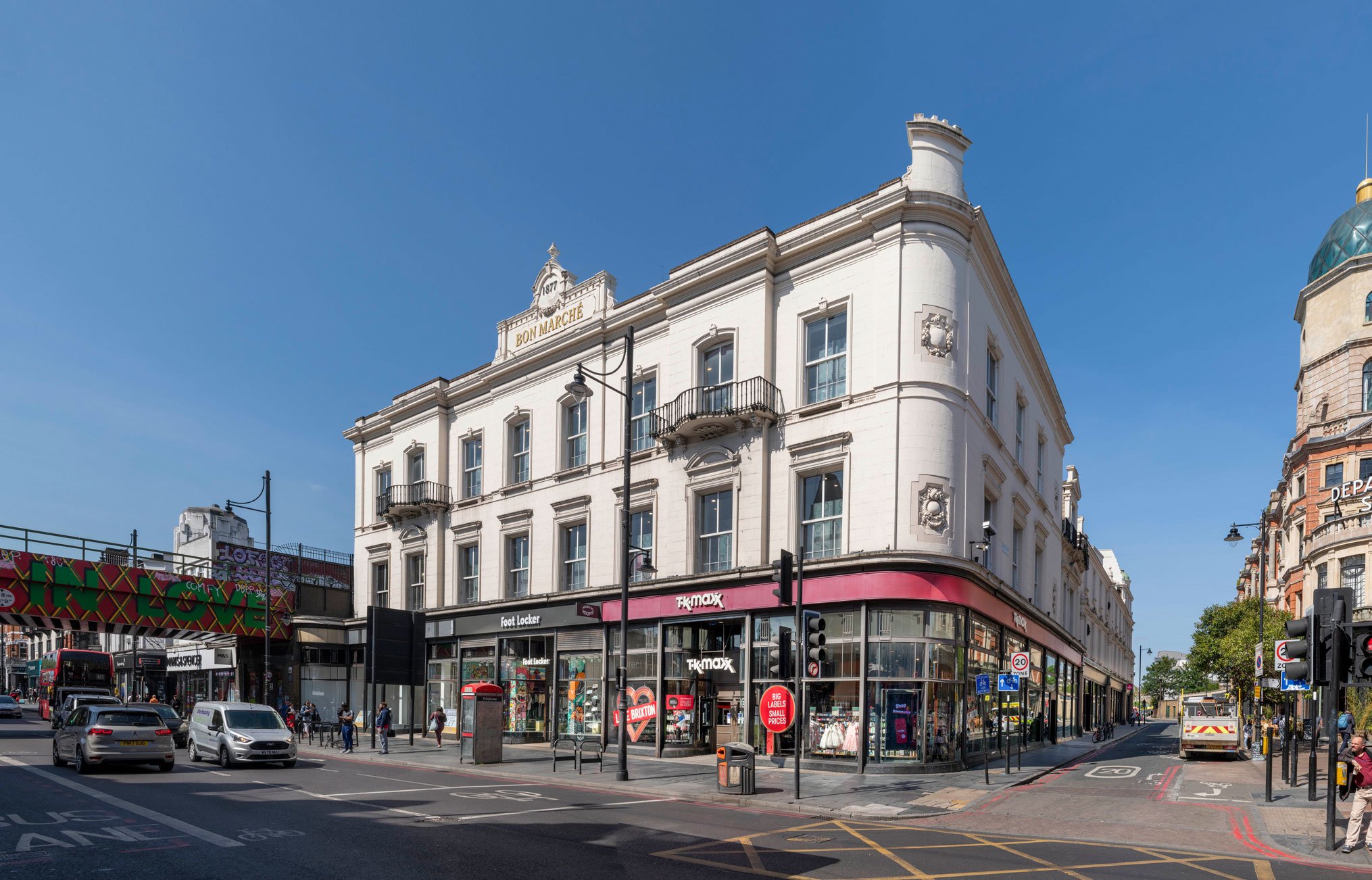 A three-storey Victorian department store with modern shopfronts to the ground floor.