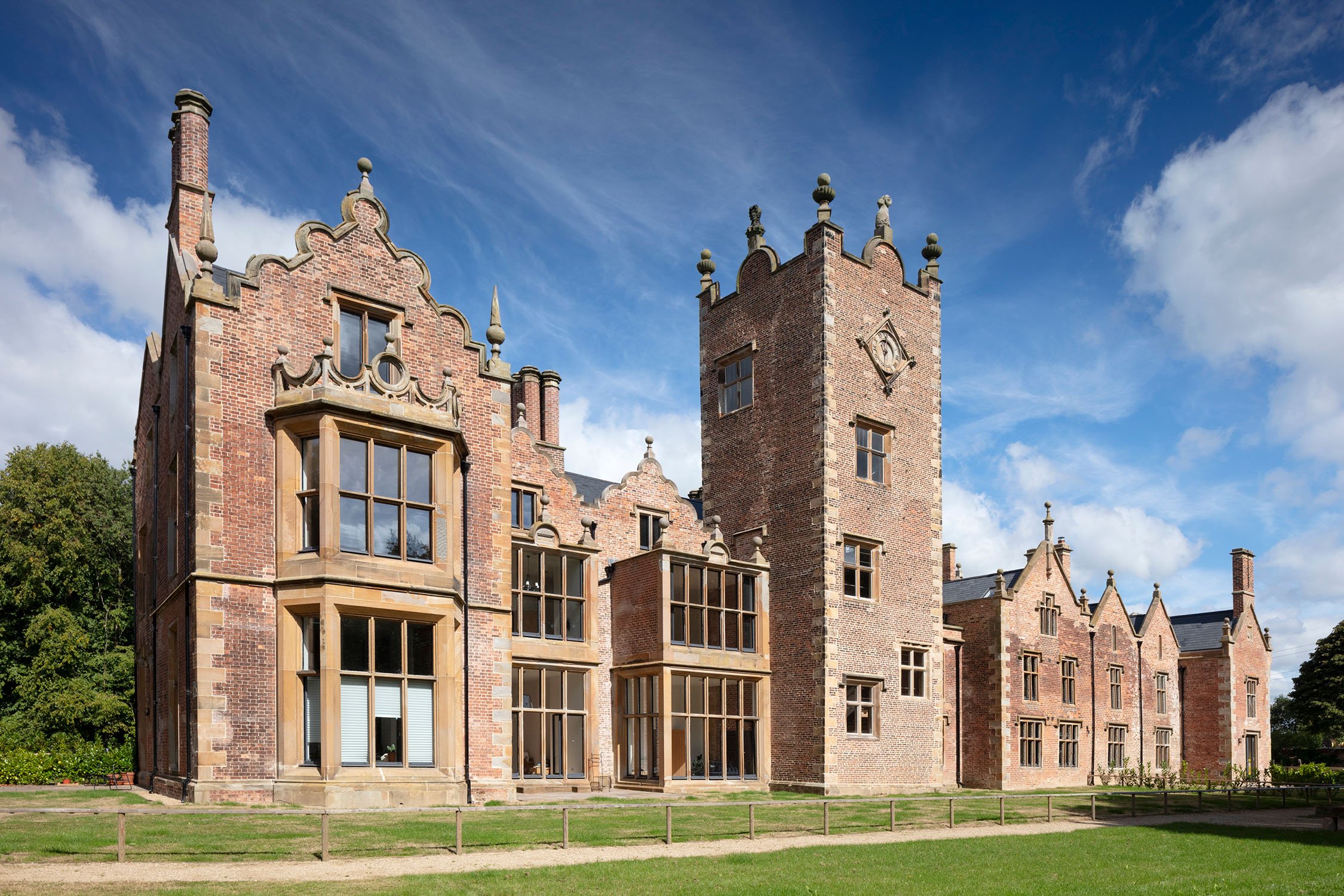 A medium-sized stately home built in red brick